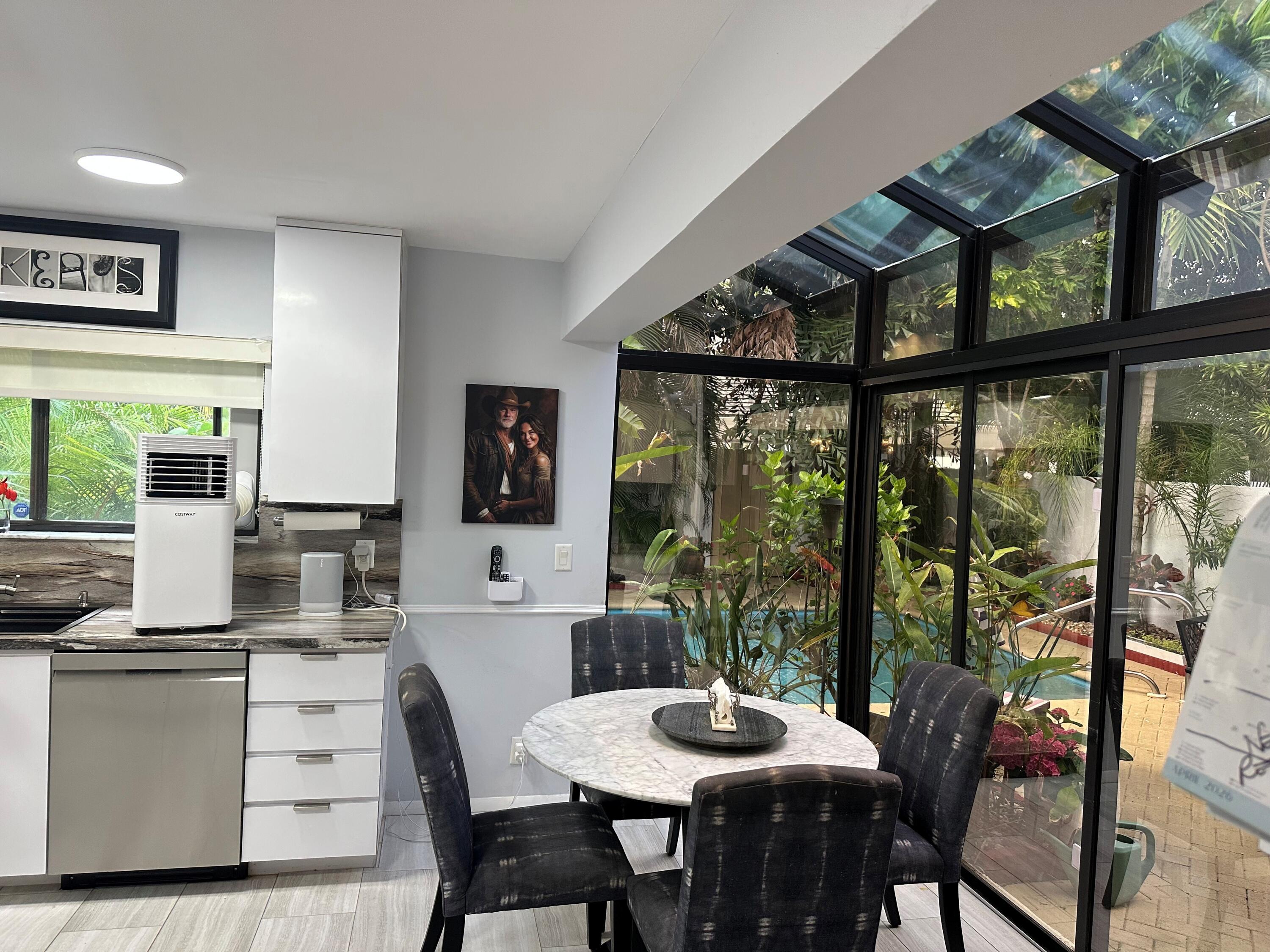 7362 Woodmont Court Boca Raton, FL 33434 - Photo 7 of 14 eat in kitchen