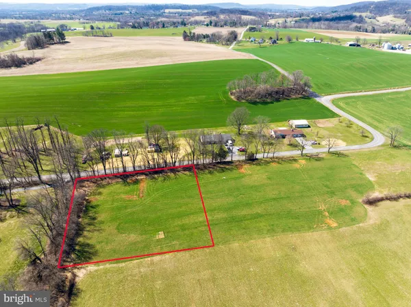 a view of a lake with a big yard