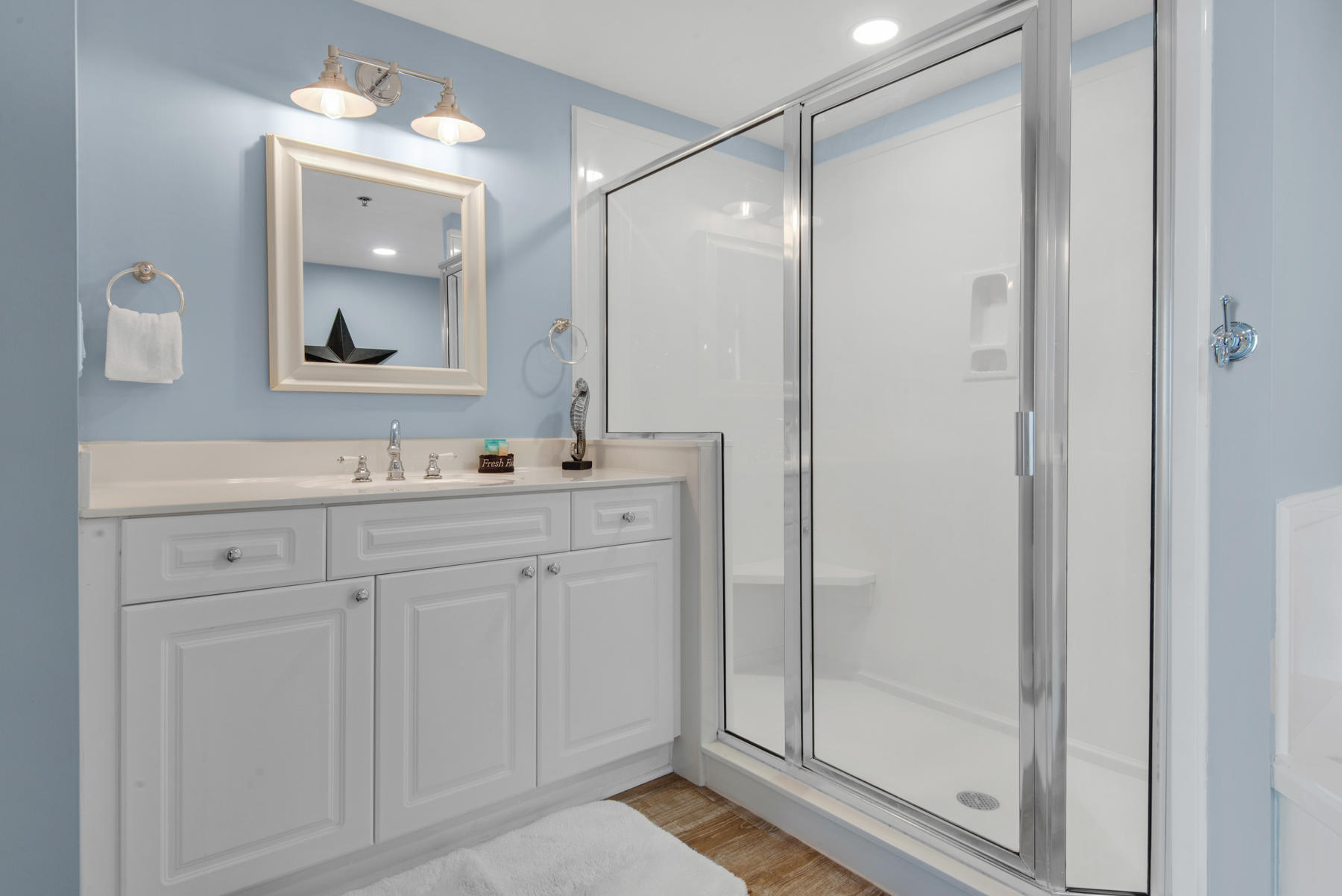 1110 Santa Rosa Boulevard, Unit B501 Fort Walton Beach, FL 32548 - Photo 28 of 51 a bathroom with a double vanity sink and mirror