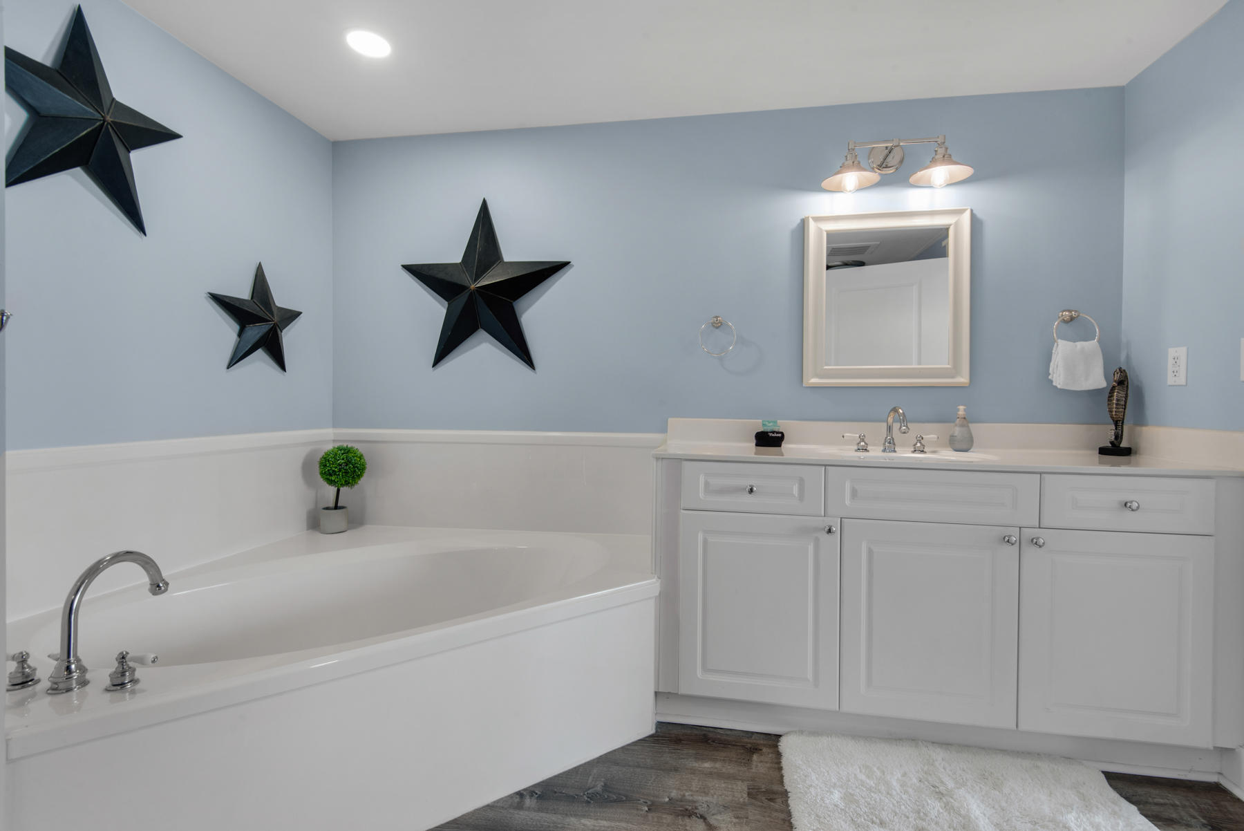 1110 Santa Rosa Boulevard, Unit B501 Fort Walton Beach, FL 32548 - Photo 30 of 51 a bathroom with a sink and a mirror