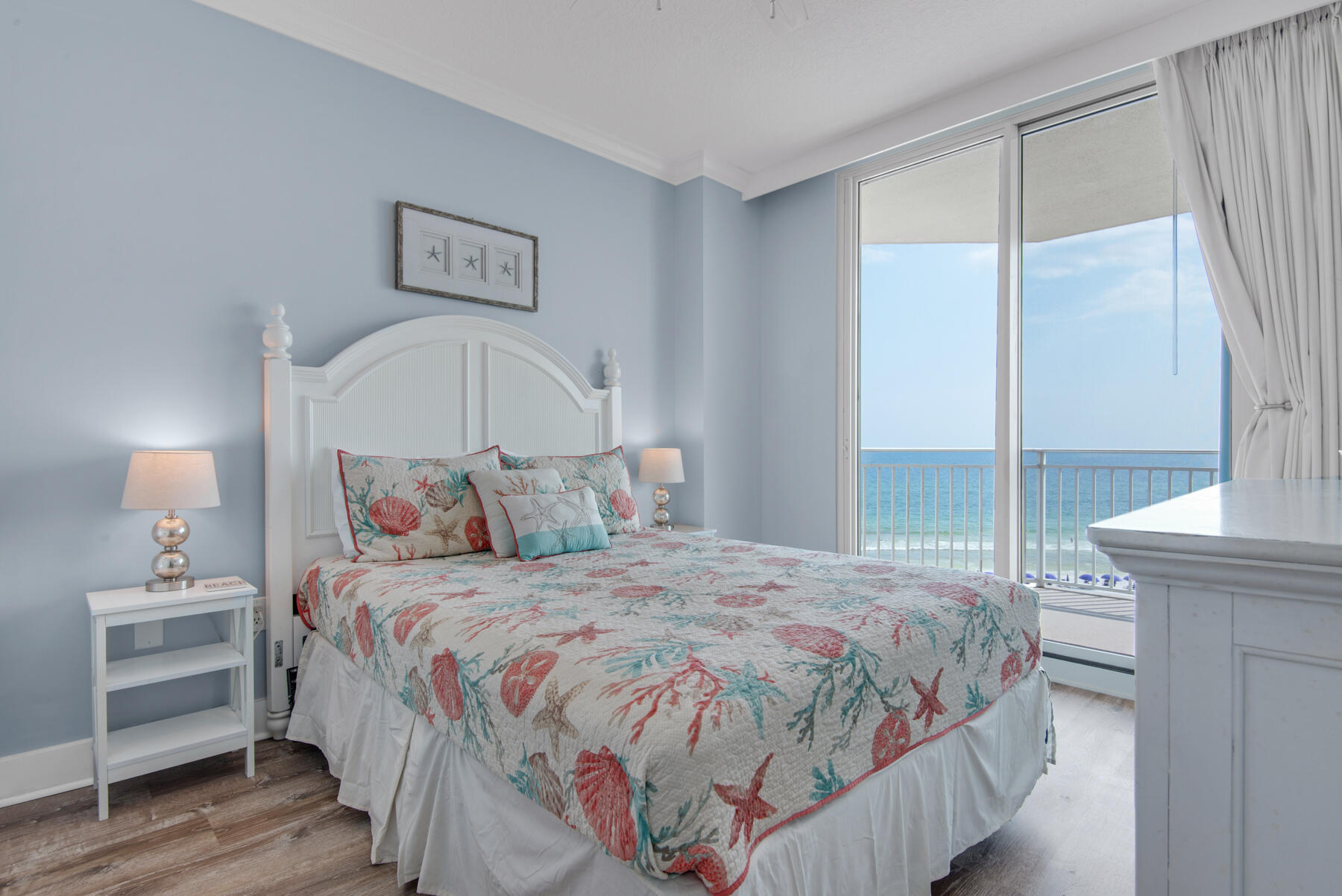 1110 Santa Rosa Boulevard, Unit B501 Fort Walton Beach, FL 32548 - Photo 31 of 51 a bedroom with a bed and a chandelier