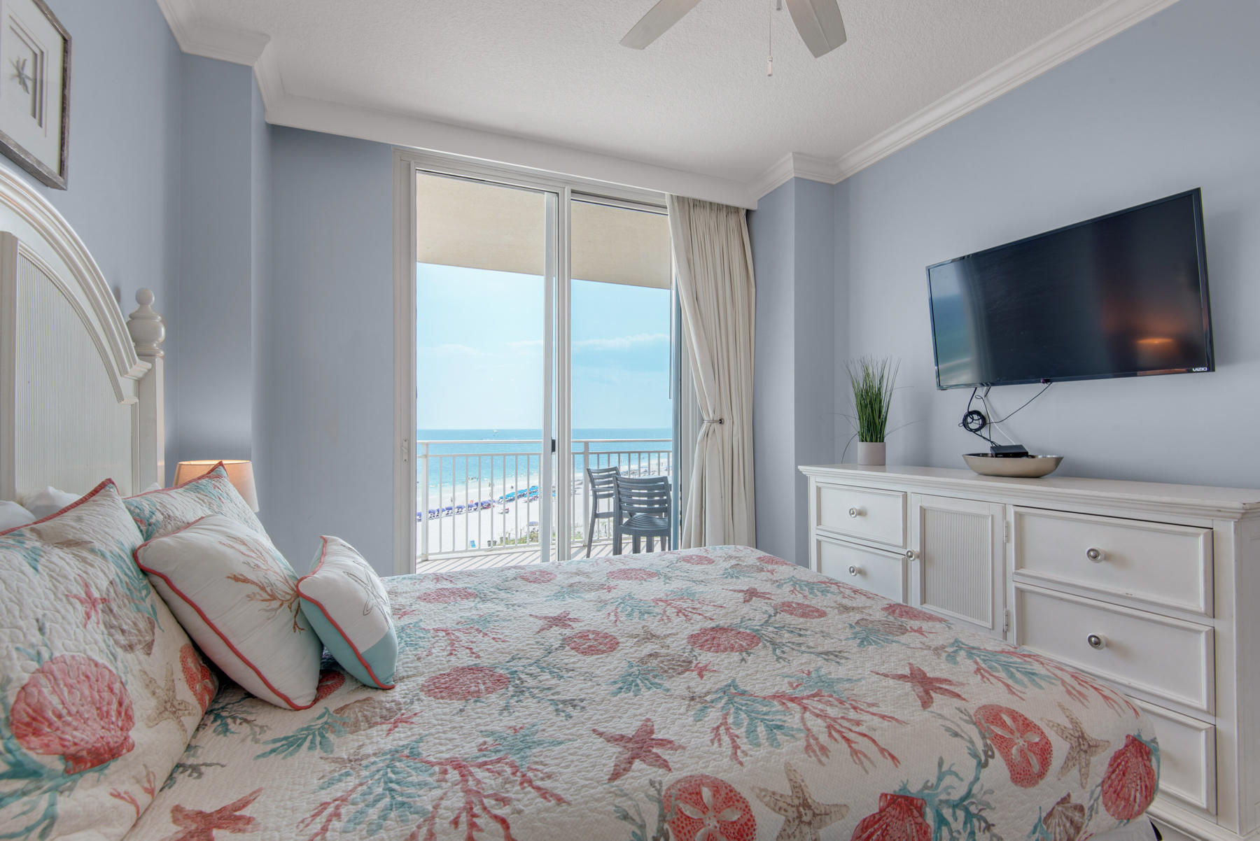 1110 Santa Rosa Boulevard, Unit B501 Fort Walton Beach, FL 32548 - Photo 32 of 51 a bedroom with a large bed and a flat screen tv