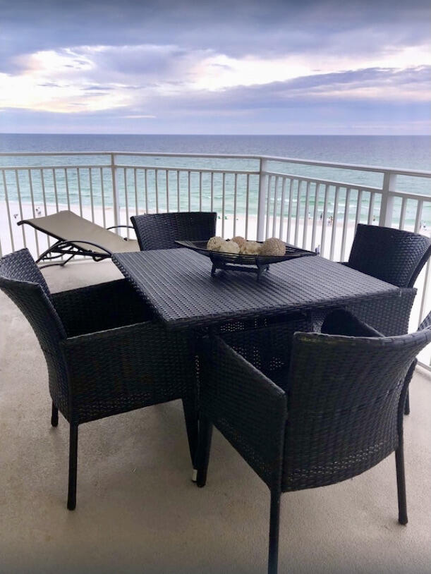 1110 Santa Rosa Boulevard, Unit B501 Fort Walton Beach, FL 32548 - Photo 48 of 51 a view of a balcony dining table and chairs