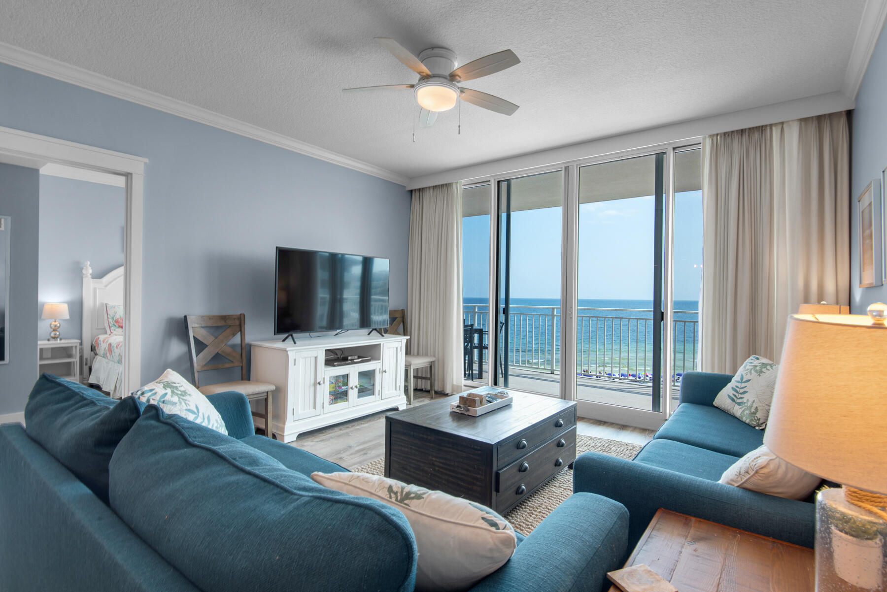 1110 Santa Rosa Boulevard, Unit B501 Fort Walton Beach, FL 32548 - Photo 9 of 51 a living room with furniture and a flat screen tv