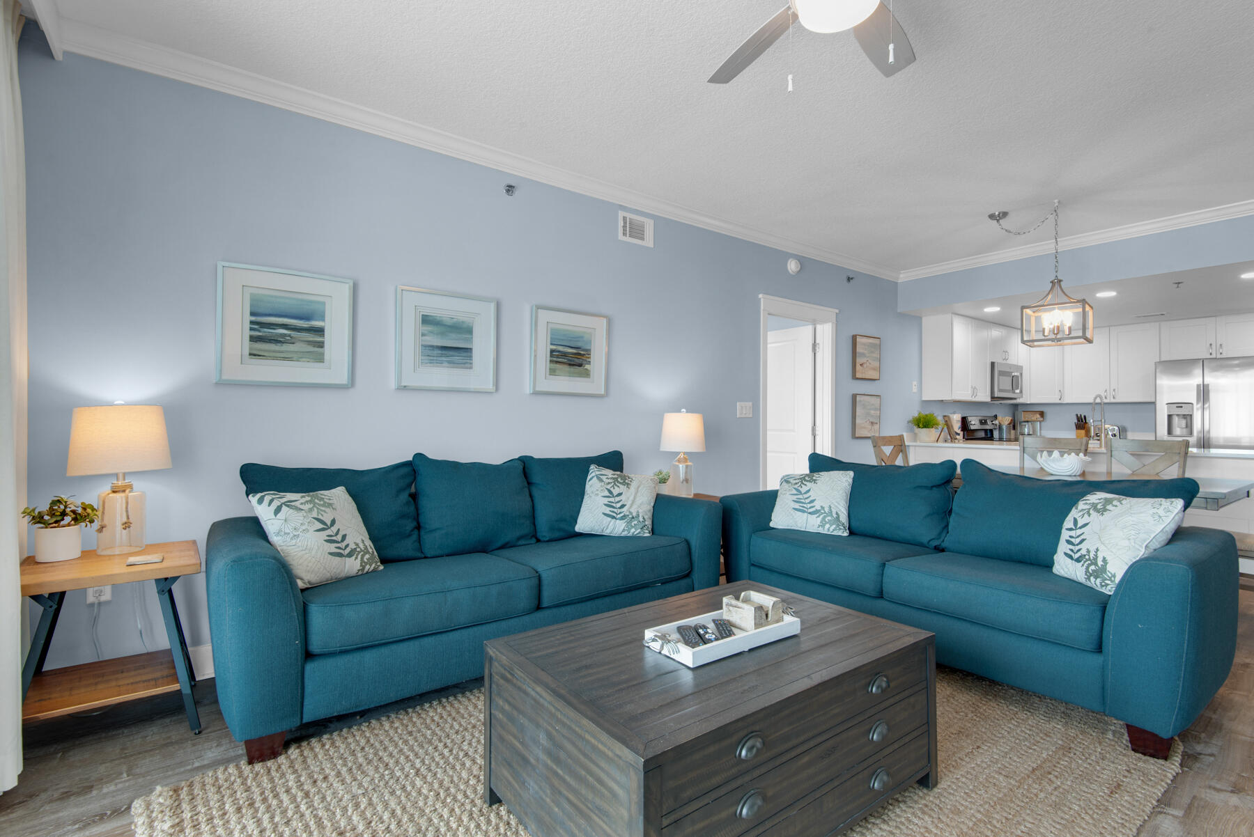 1110 Santa Rosa Boulevard, Unit B501 Fort Walton Beach, FL 32548 - Photo 10 of 51 a living room with furniture a rug and a lamp