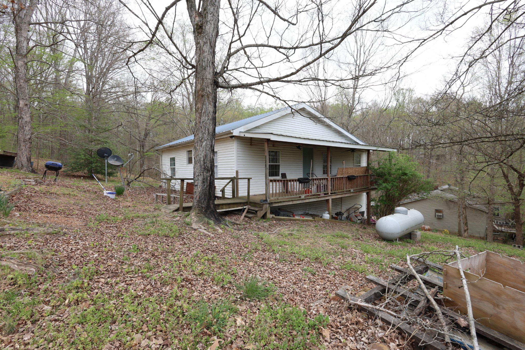 109 Furnace Hill Road Indian Mound, TN 37079 - Photo 7 of 17 a view of a couches and table under an umbrella
