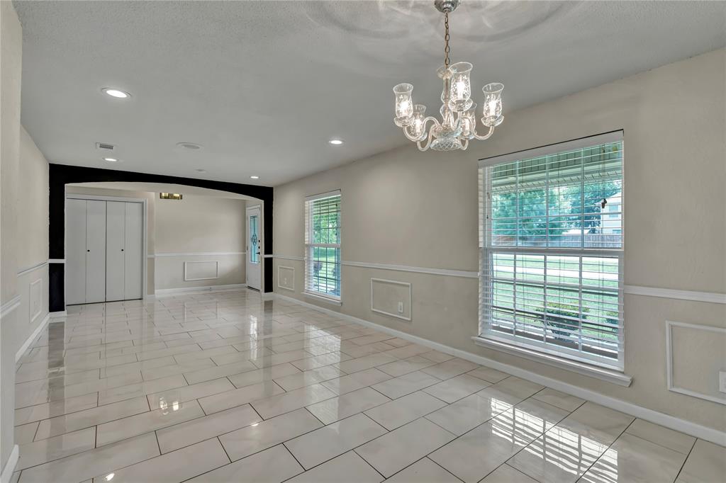 4405 Ray White Road Fort Worth, TX 76244 - Photo 5 of 36 a view of an empty room with a window