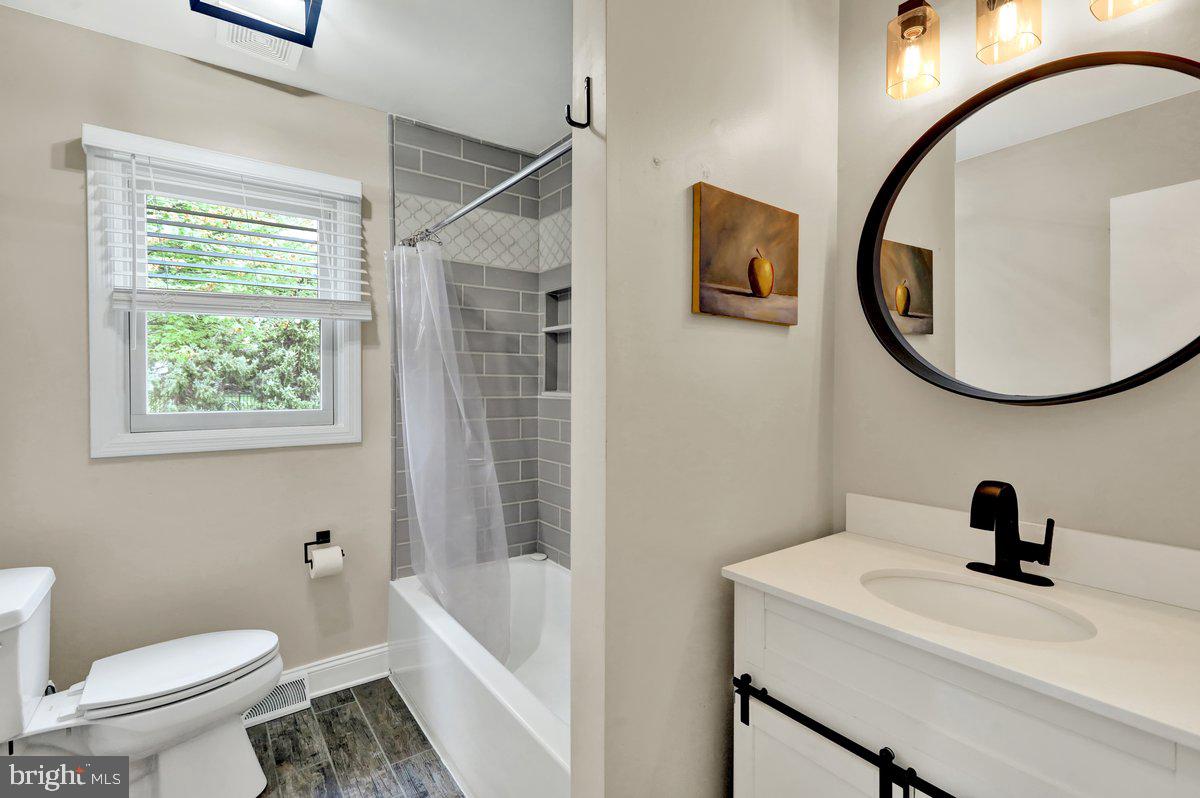 521 Hummingbird Drive Lititz, PA 17543 - Photo 21 of 38 a bathroom with a sink a toilet and a mirror