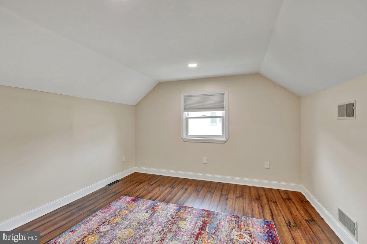 521 Hummingbird Drive Lititz, PA 17543 - Photo 23 of 38 a view of empty room with wooden floor