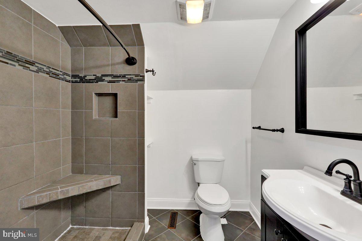 521 Hummingbird Drive Lititz, PA 17543 - Photo 29 of 38 a bathroom with a toilet a sink and shower