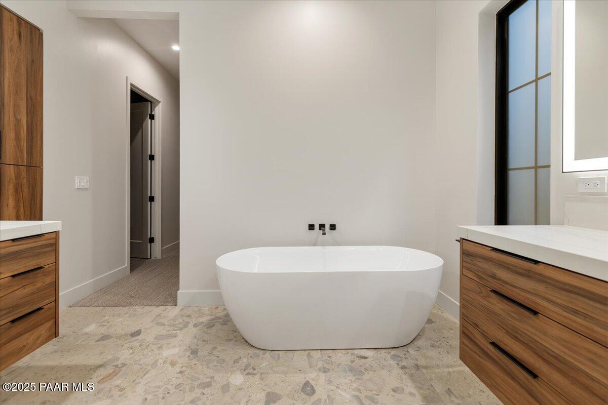 125 Rotonda Way Prescott, AZ 86301 - Photo 25 of 38 a white bath tub sitting in a bathroom