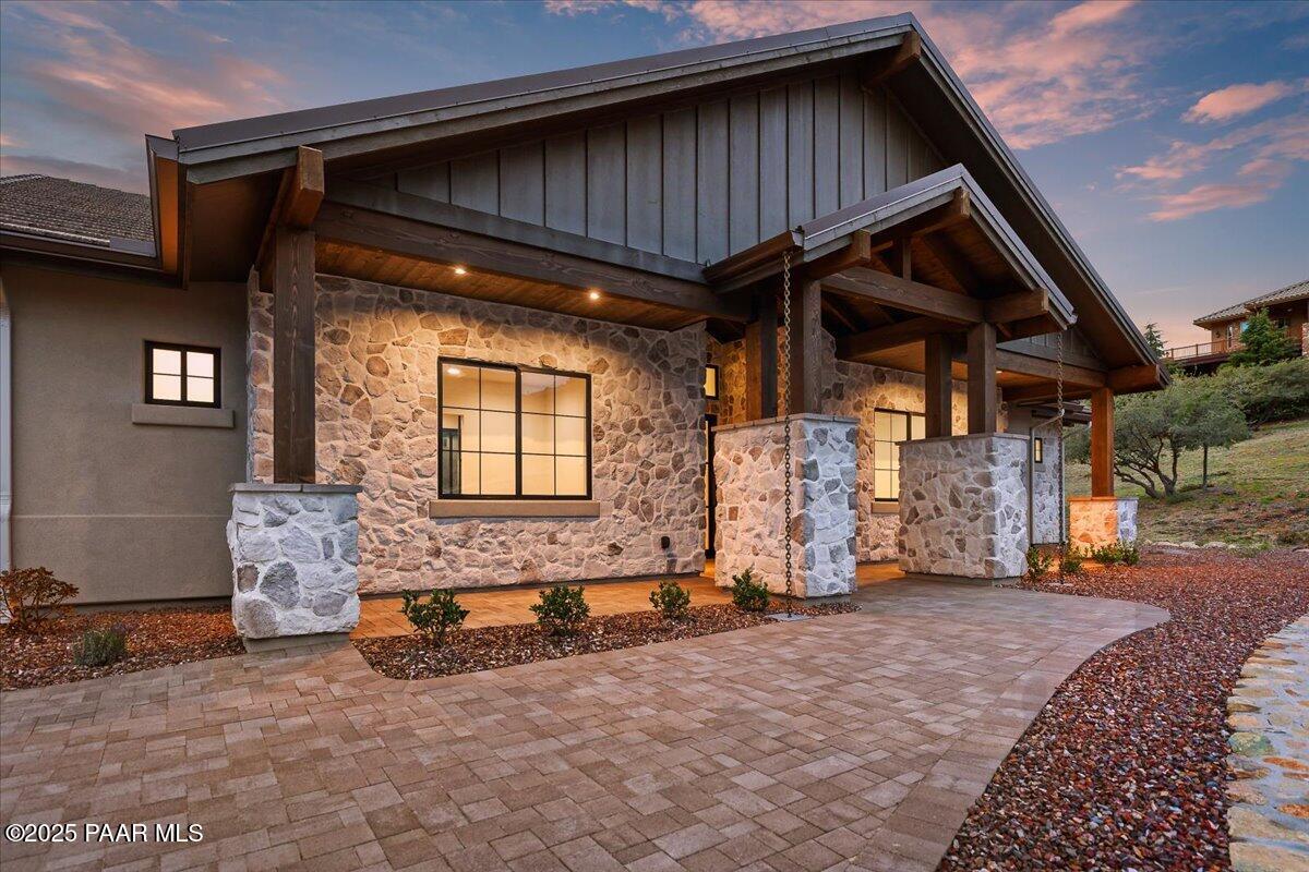 125 Rotonda Way Prescott, AZ 86301 - Photo 3 of 38 a view of a house with a wooden wall