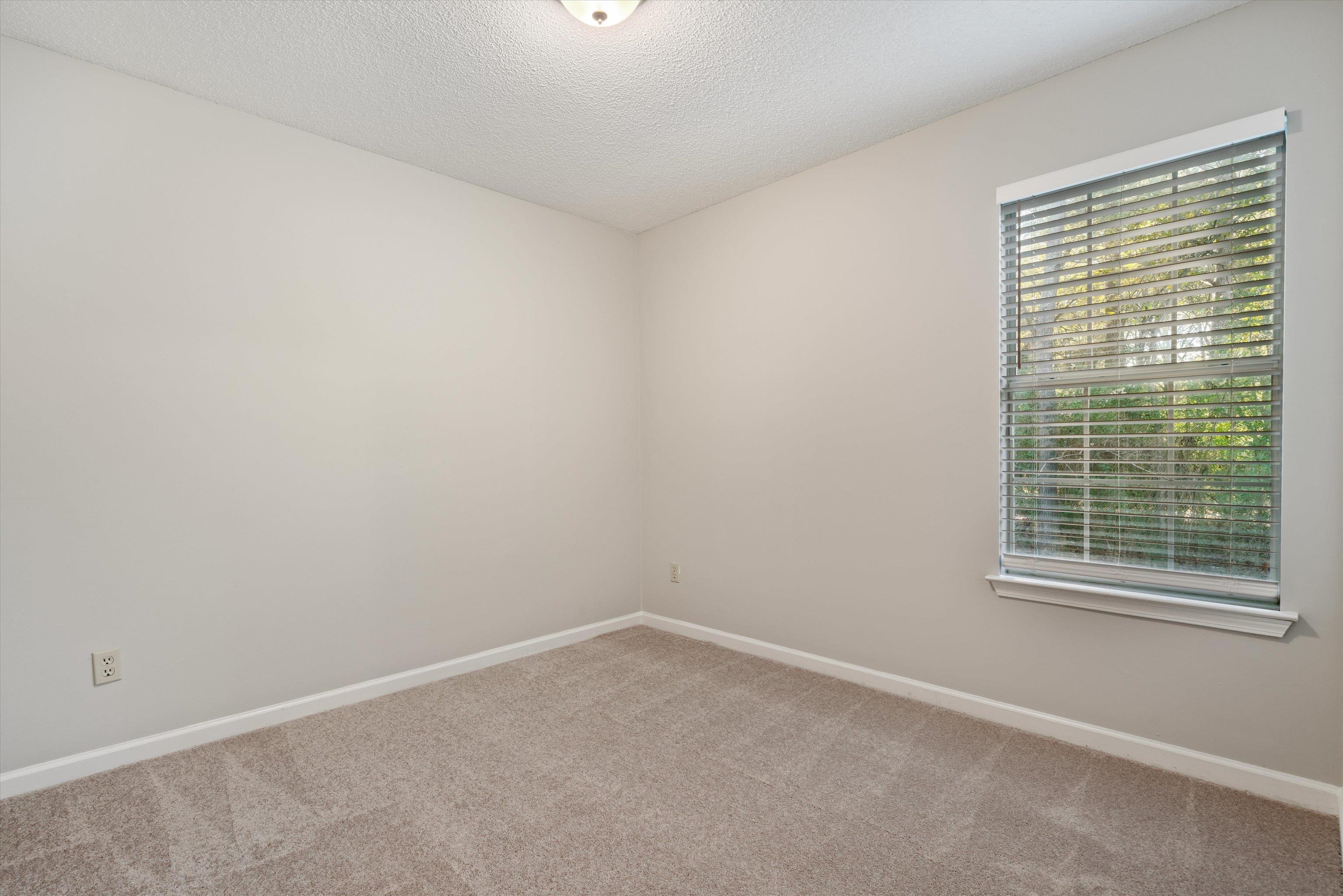 6511 Patmore Road Memphis, TN 38134 - Photo 15 of 22 an empty room with a window