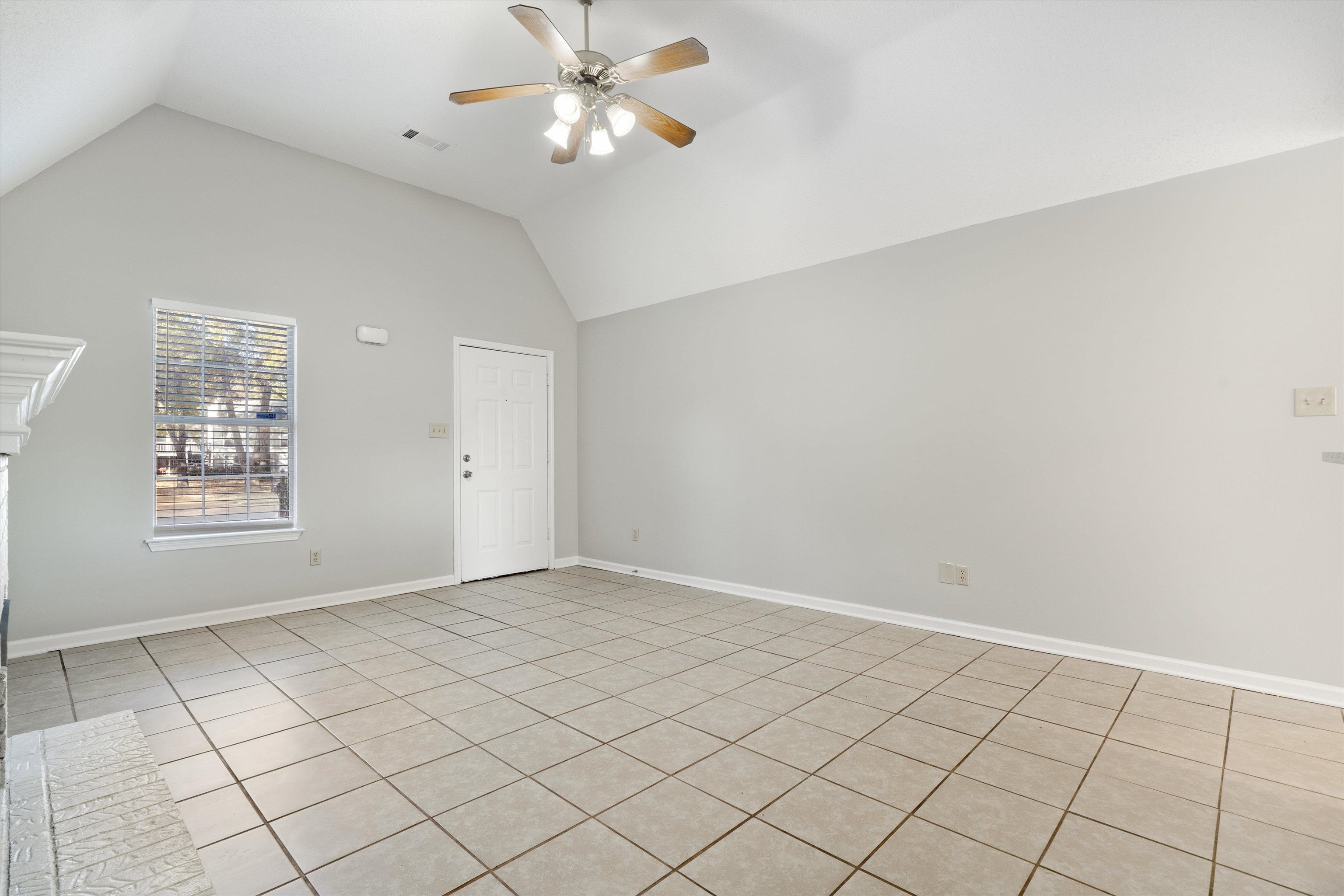 6511 Patmore Road Memphis, TN 38134 - Photo 5 of 22 a view of an empty room and window