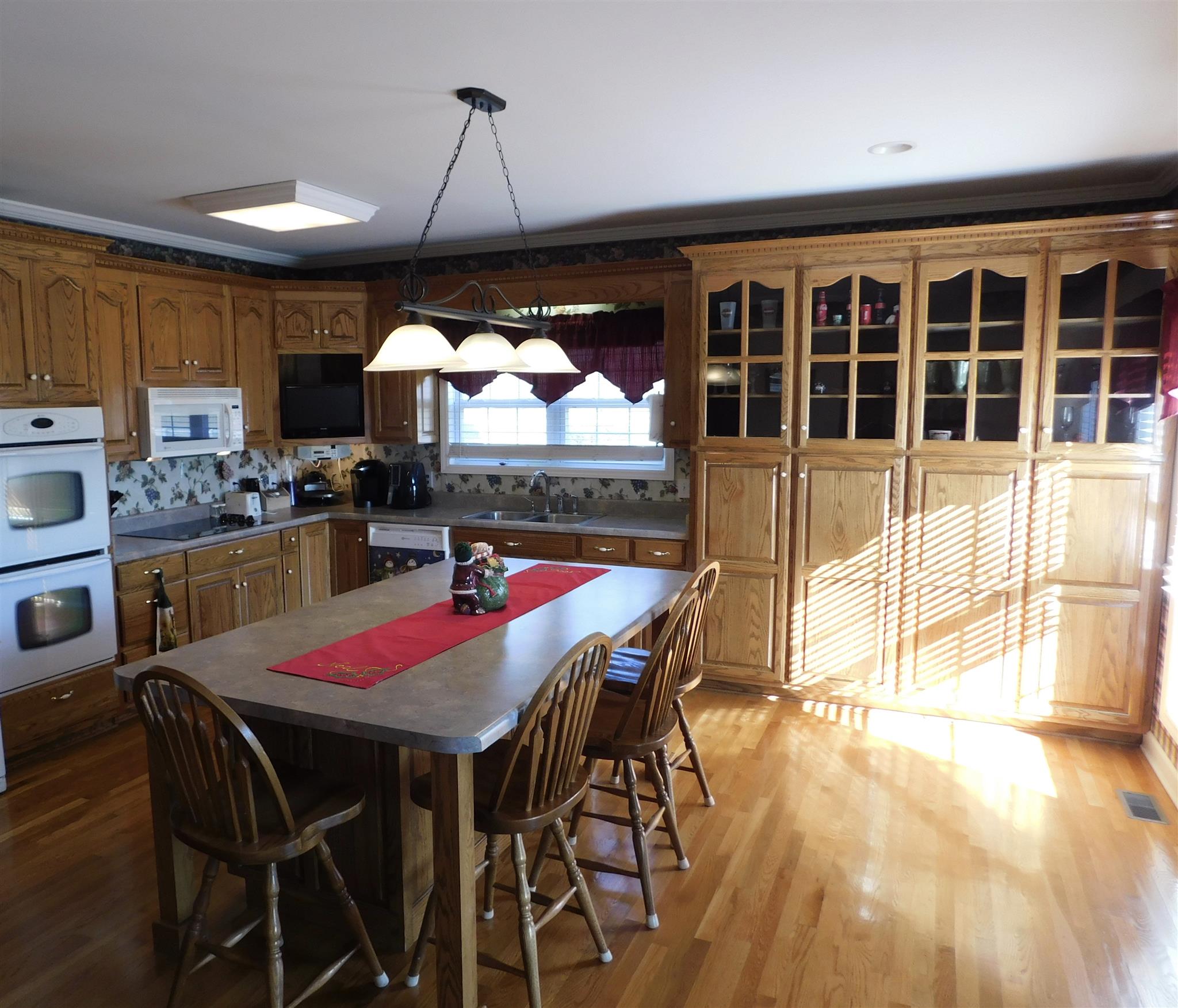 137 Cyril Wiser Road Manchester, TN 37355 - Photo 9 of 21 a view of a dining room with furniture and a window