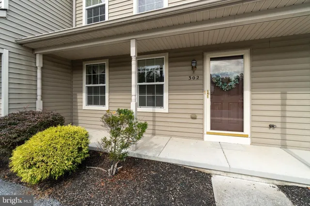 a house with a flower garden