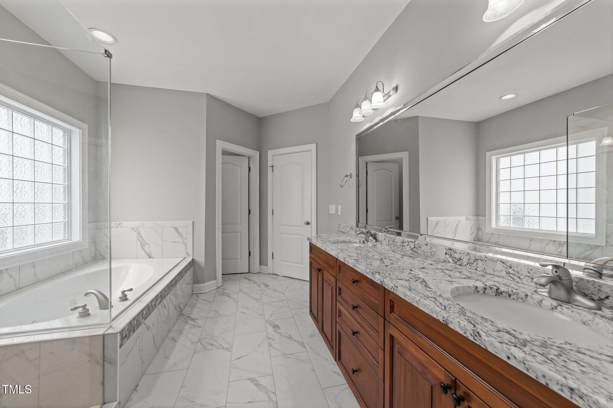 12217 Beestone Lane Raleigh, NC 27614 - Photo 17 of 48 Owners Bath