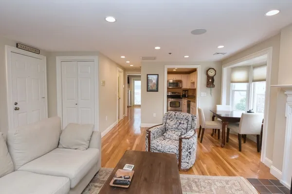 a bedroom with a large bed and a large window