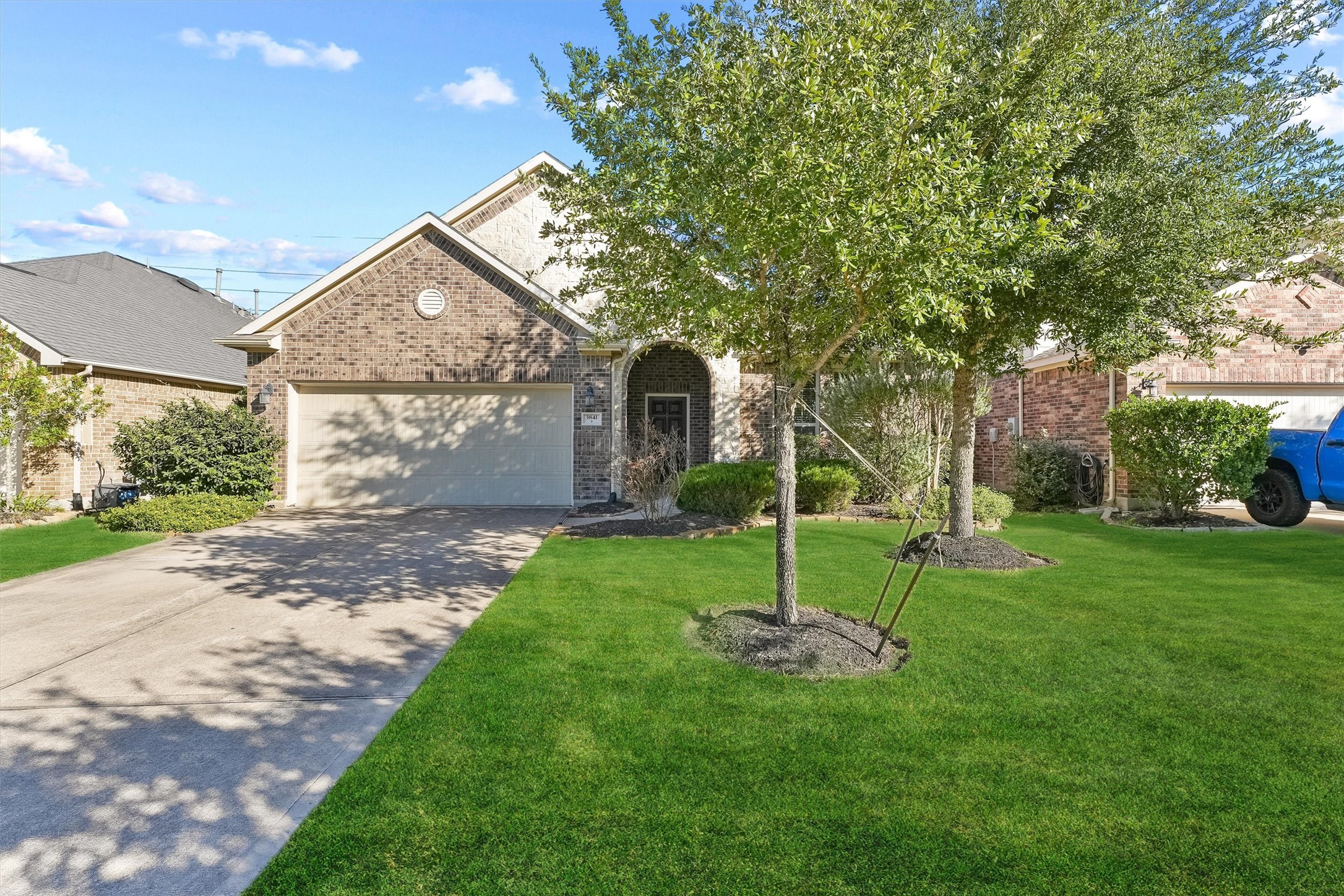 3841 Enchanted Timbers Lane Spring, TX 77386 - Photo 1 of 28 a view of a yard with a house