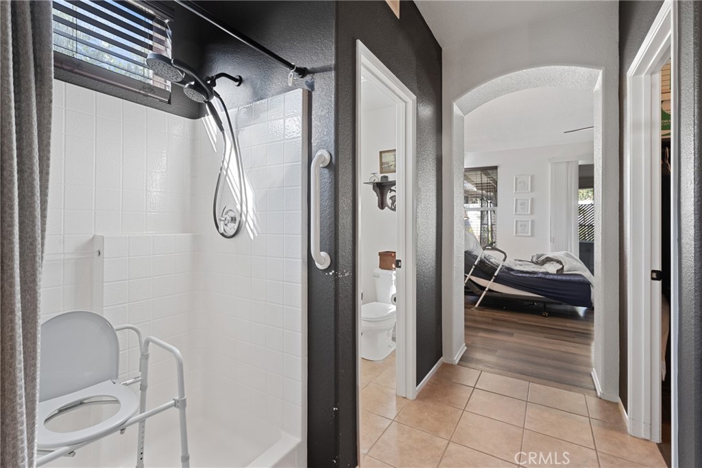 1851 Riviera Avenue Banning, CA 92220 - Photo 18 of 35 a bathroom with a tub and shower