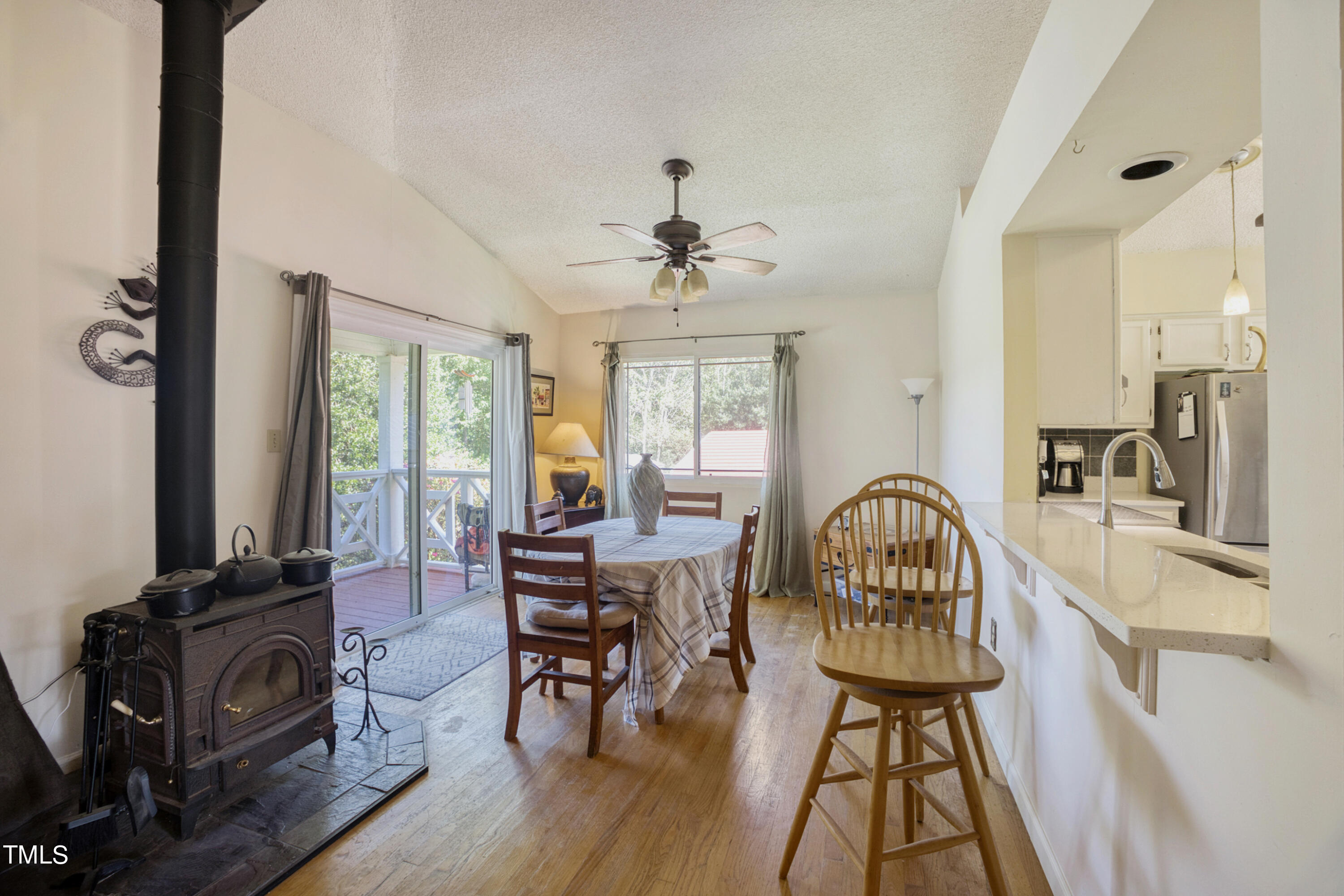 2650 Schloss Road Louisburg, NC 27549 - Photo 12 of 48 a view of a livingroom with furniture and a flat screen tv