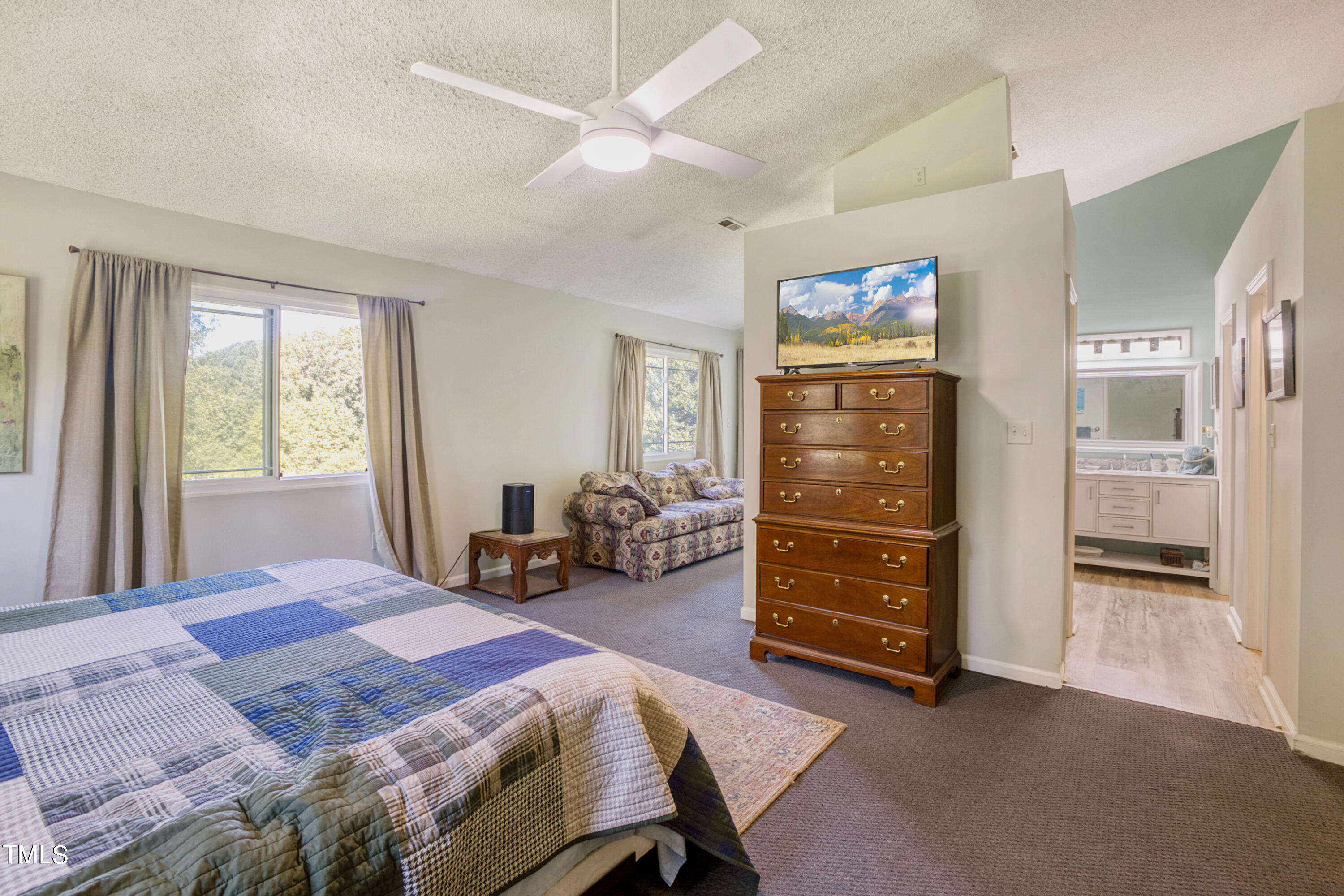 2650 Schloss Road Louisburg, NC 27549 - Photo 18 of 48 a bedroom with a bed and furniture