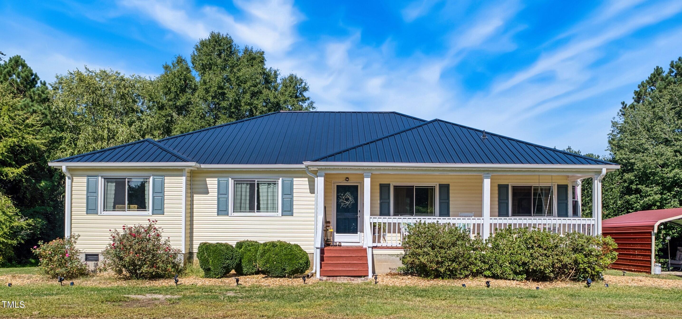2650 Schloss Road Louisburg, NC 27549 - Photo 2 of 48 a view of a house with a yard