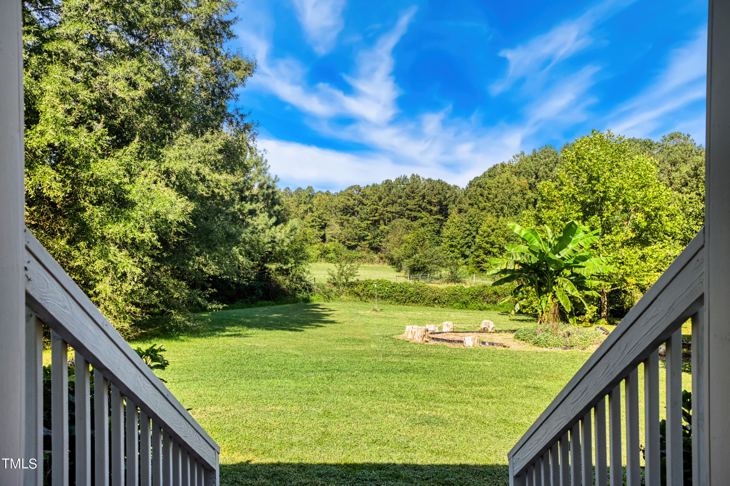 2650 Schloss Road Louisburg, NC 27549 - Photo 30 of 48 a view of a garden from a balcony