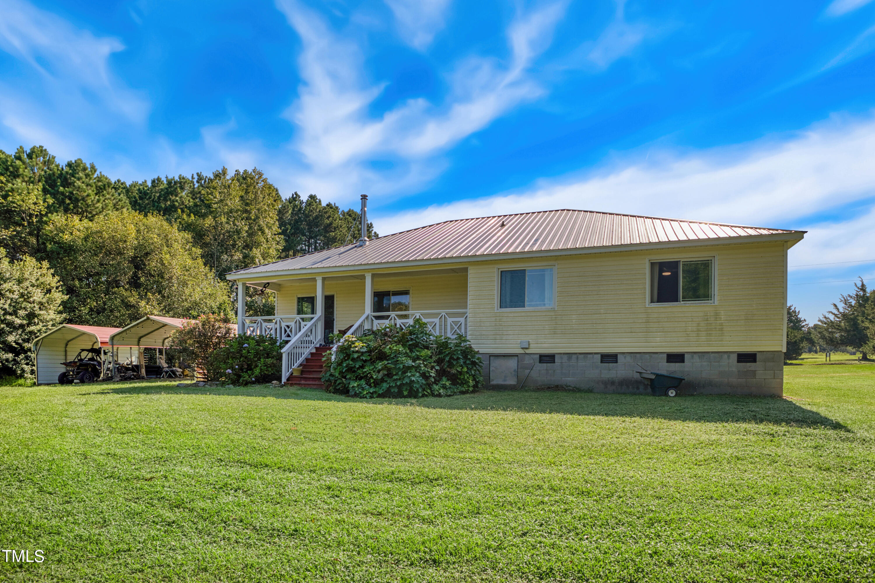 2650 Schloss Road Louisburg, NC 27549 - Photo 33 of 48 a view of a house with a yard