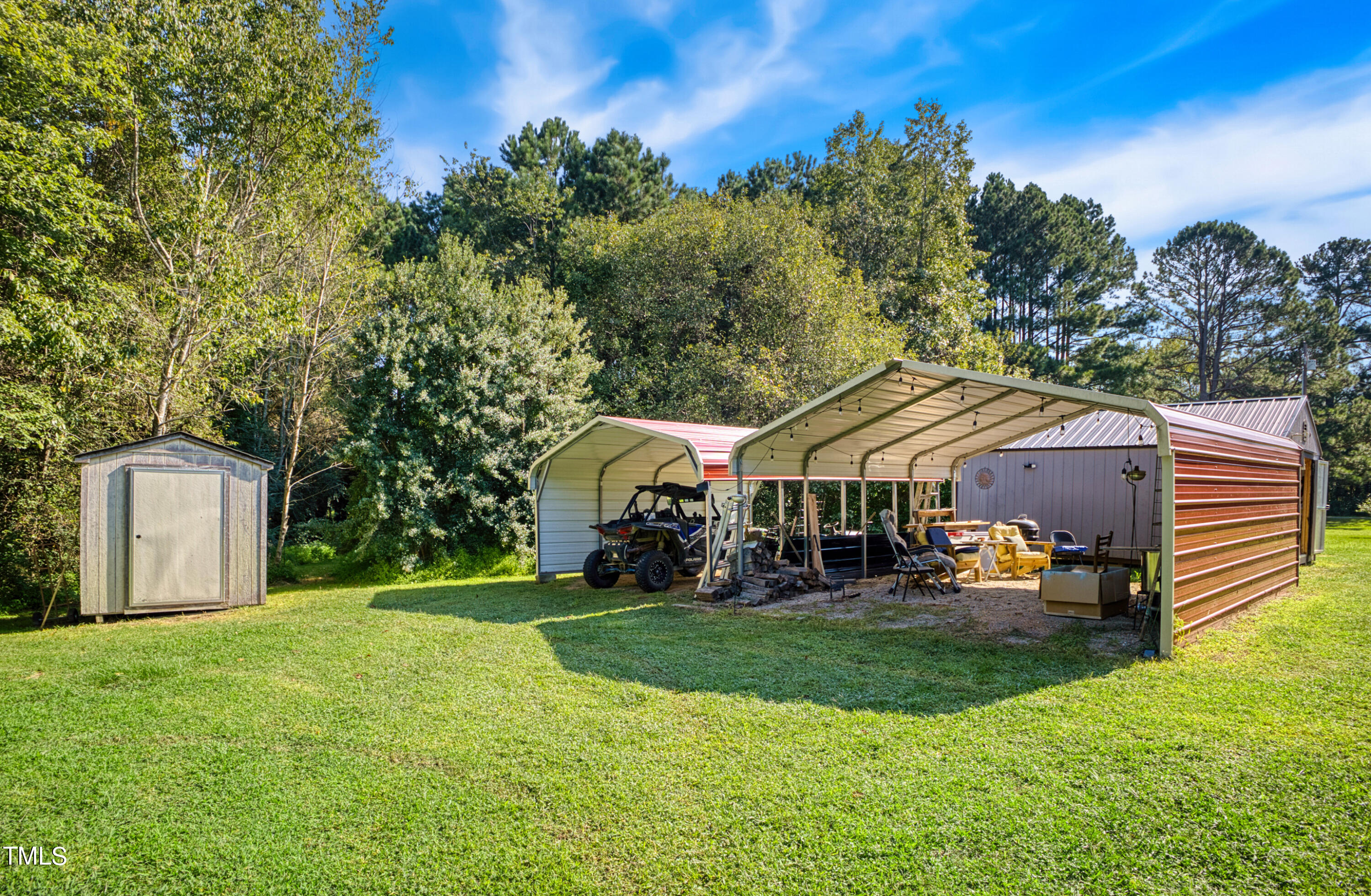 2650 Schloss Road Louisburg, NC 27549 - Photo 35 of 48 a front view of a house with garden