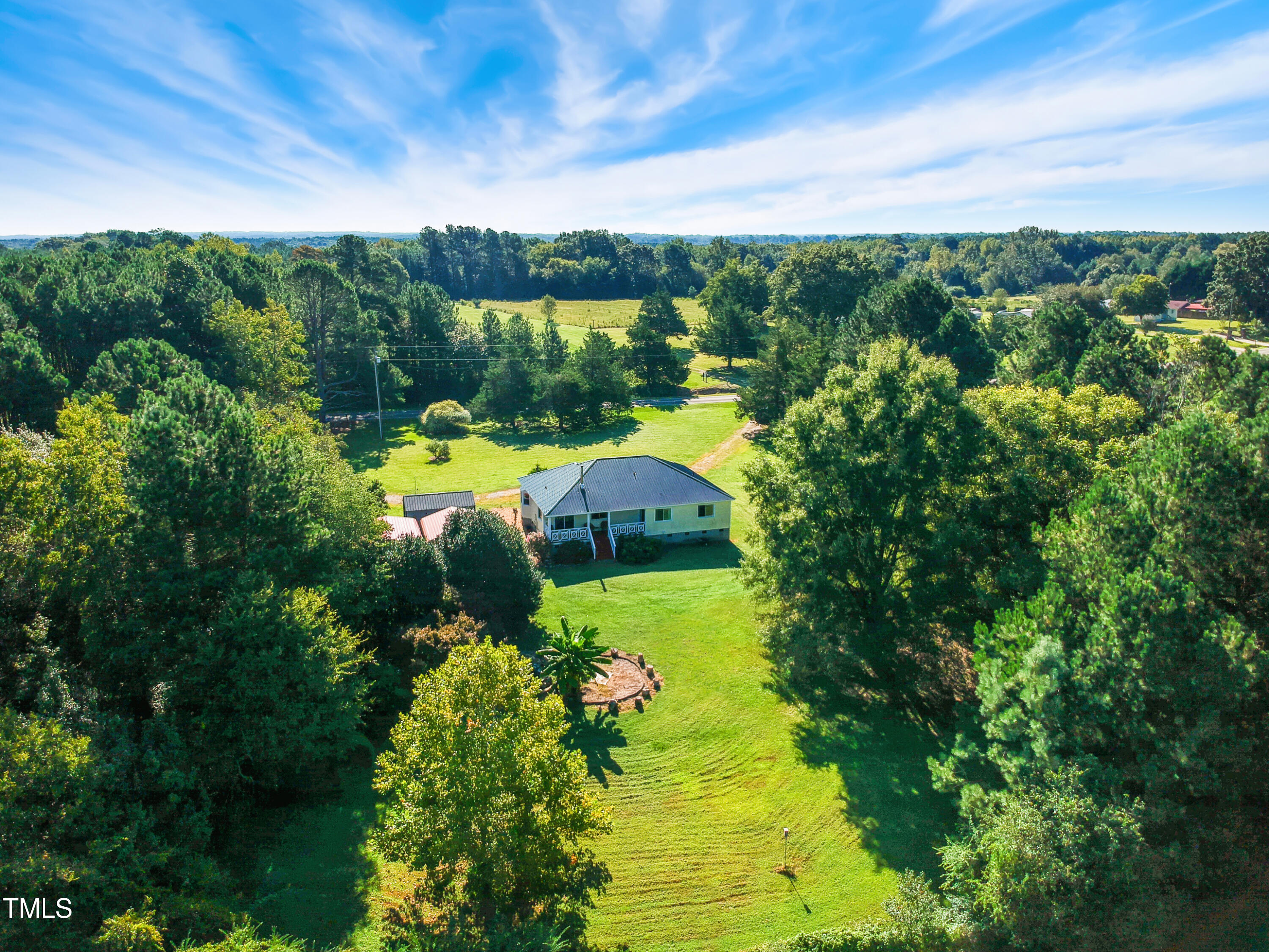 2650 Schloss Road Louisburg, NC 27549 - Photo 38 of 48 a view of a lake with a yard