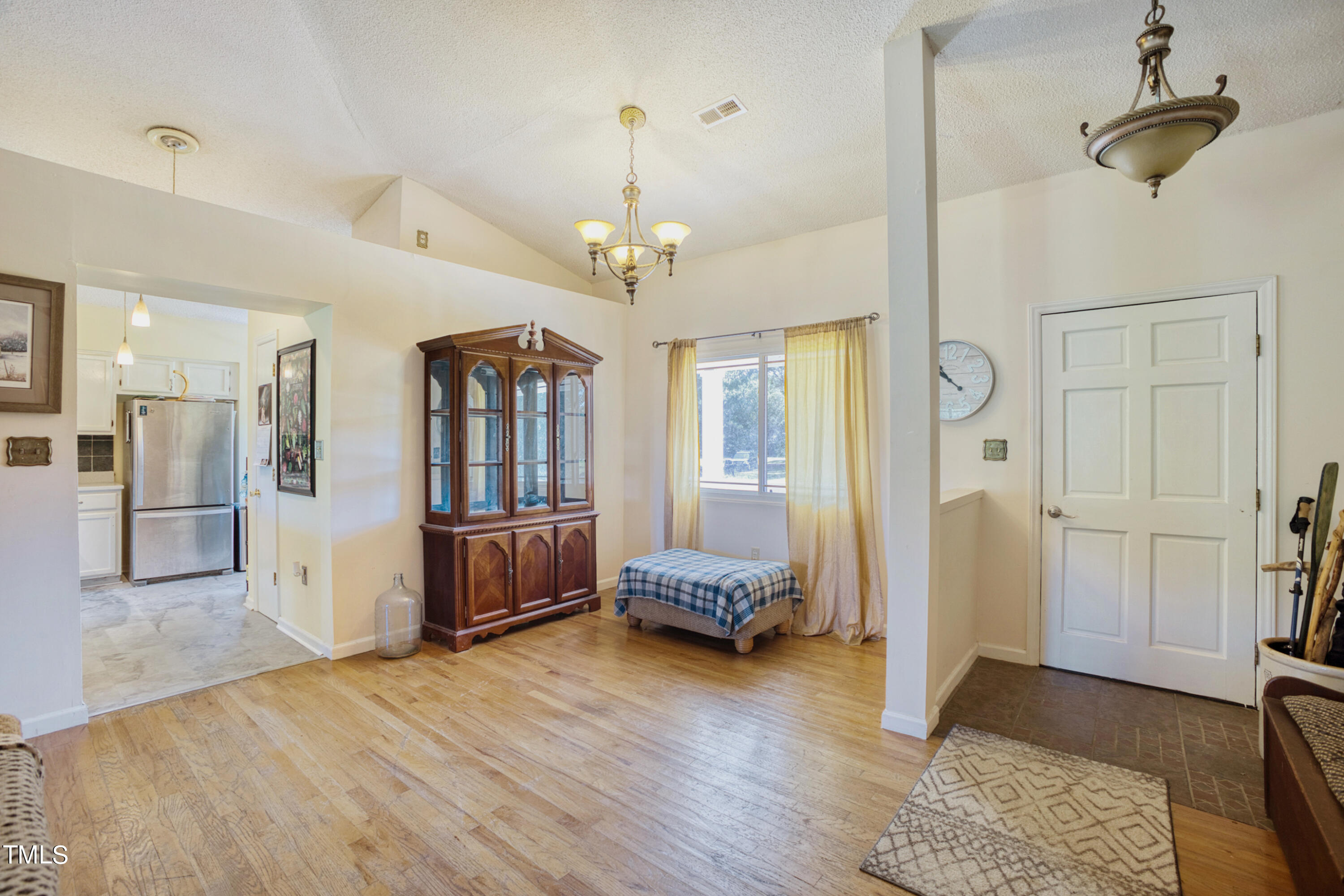 2650 Schloss Road Louisburg, NC 27549 - Photo 9 of 48 a view of livingroom with furniture and wooden floor