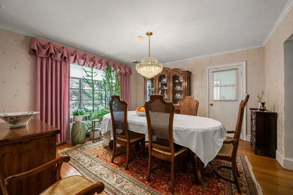 a view of a dining room with furniture window and outside view