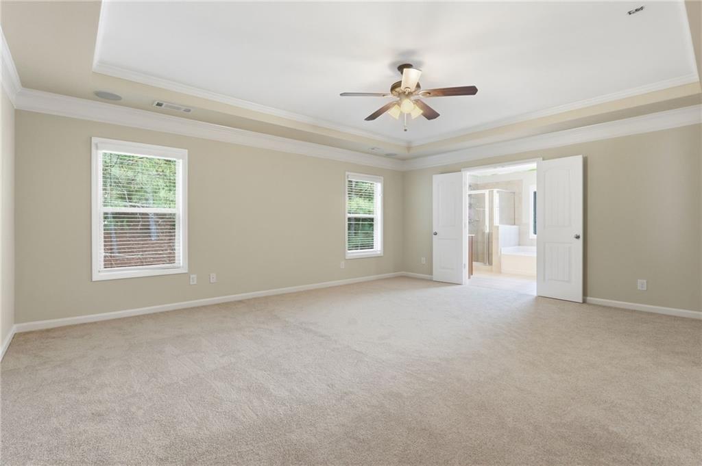 1515 Riva Ridge Suwanee, GA 30024 - Photo 30 of 35 a view of an empty room with a window