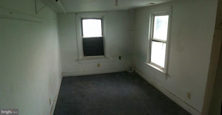 981 Otterdale Mill Road Taneytown, MD 21787 - Photo 5 of 14 a view of a livingroom with an empty space and a window