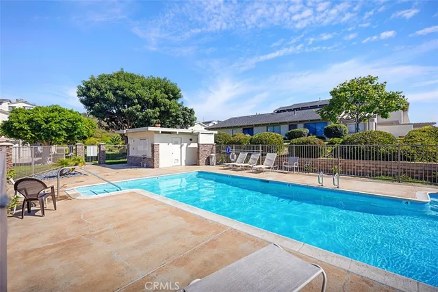 a bathroom with a granite countertop sink and mirror
