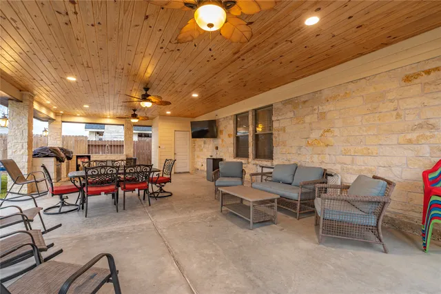 a outdoor space with lots of tables and chairs