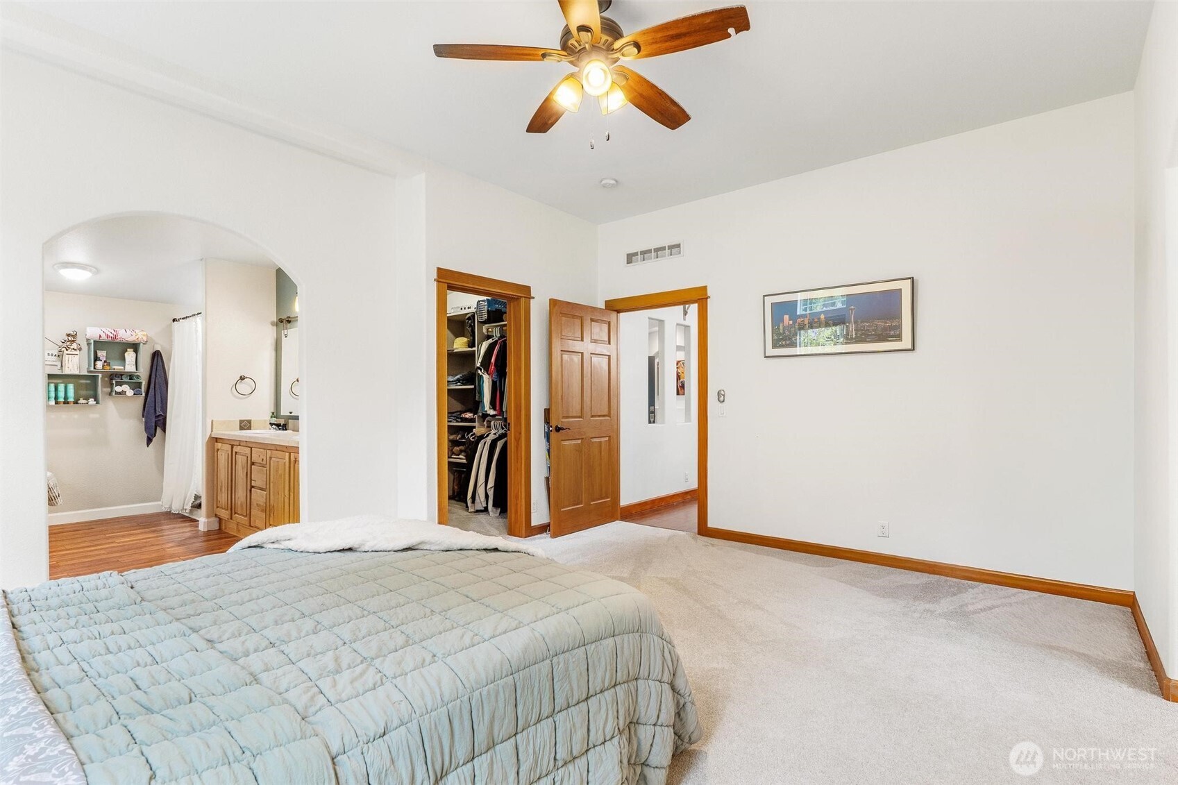 4915 Schwarzmiller Road Lake Stevens, WA 98258 - Photo 18 of 40 a bedroom with a bed and a chandelier