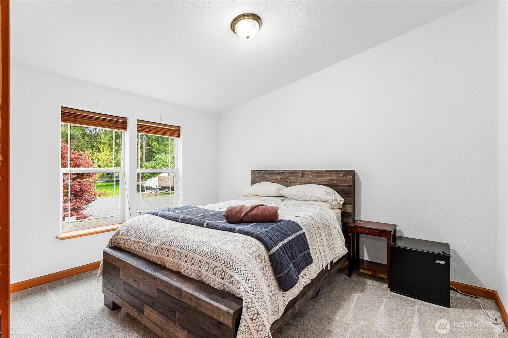 4915 Schwarzmiller Road Lake Stevens, WA 98258 - Photo 25 of 40 a bedroom with a bed and a window