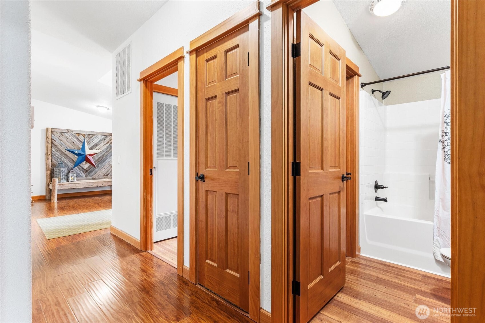 4915 Schwarzmiller Road Lake Stevens, WA 98258 - Photo 26 of 40 a very nice looking room with wooden floor and a window