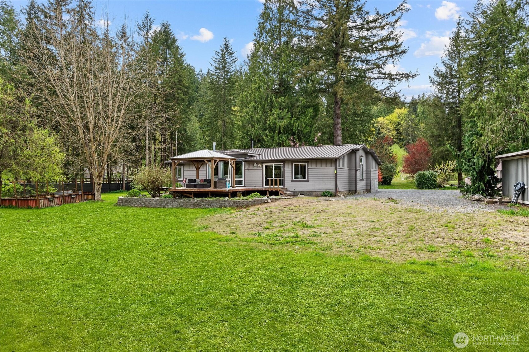 4915 Schwarzmiller Road Lake Stevens, WA 98258 - Photo 33 of 40 a front view of house with a garden