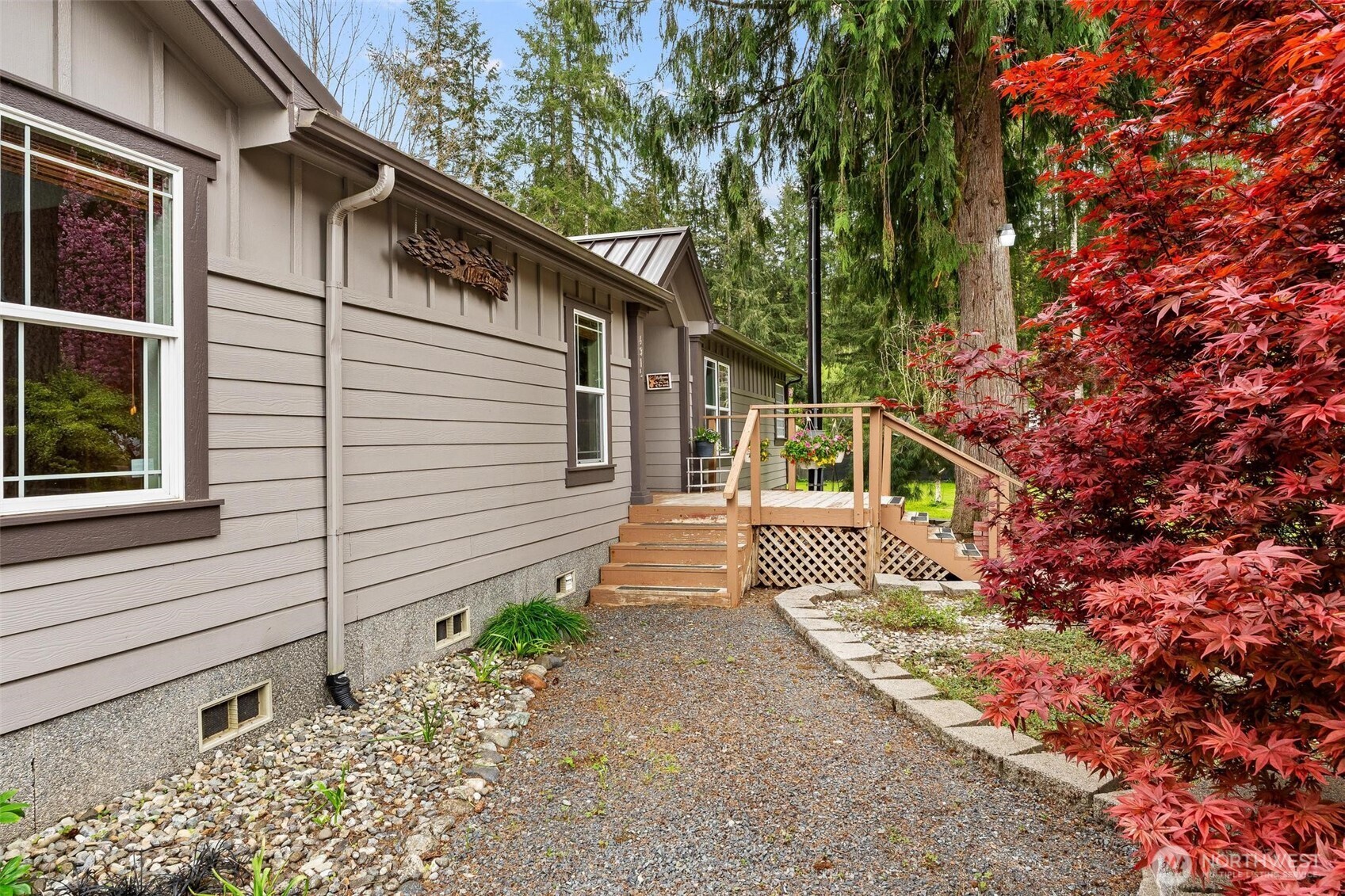 4915 Schwarzmiller Road Lake Stevens, WA 98258 - Photo 4 of 40 a front view of a house with garden