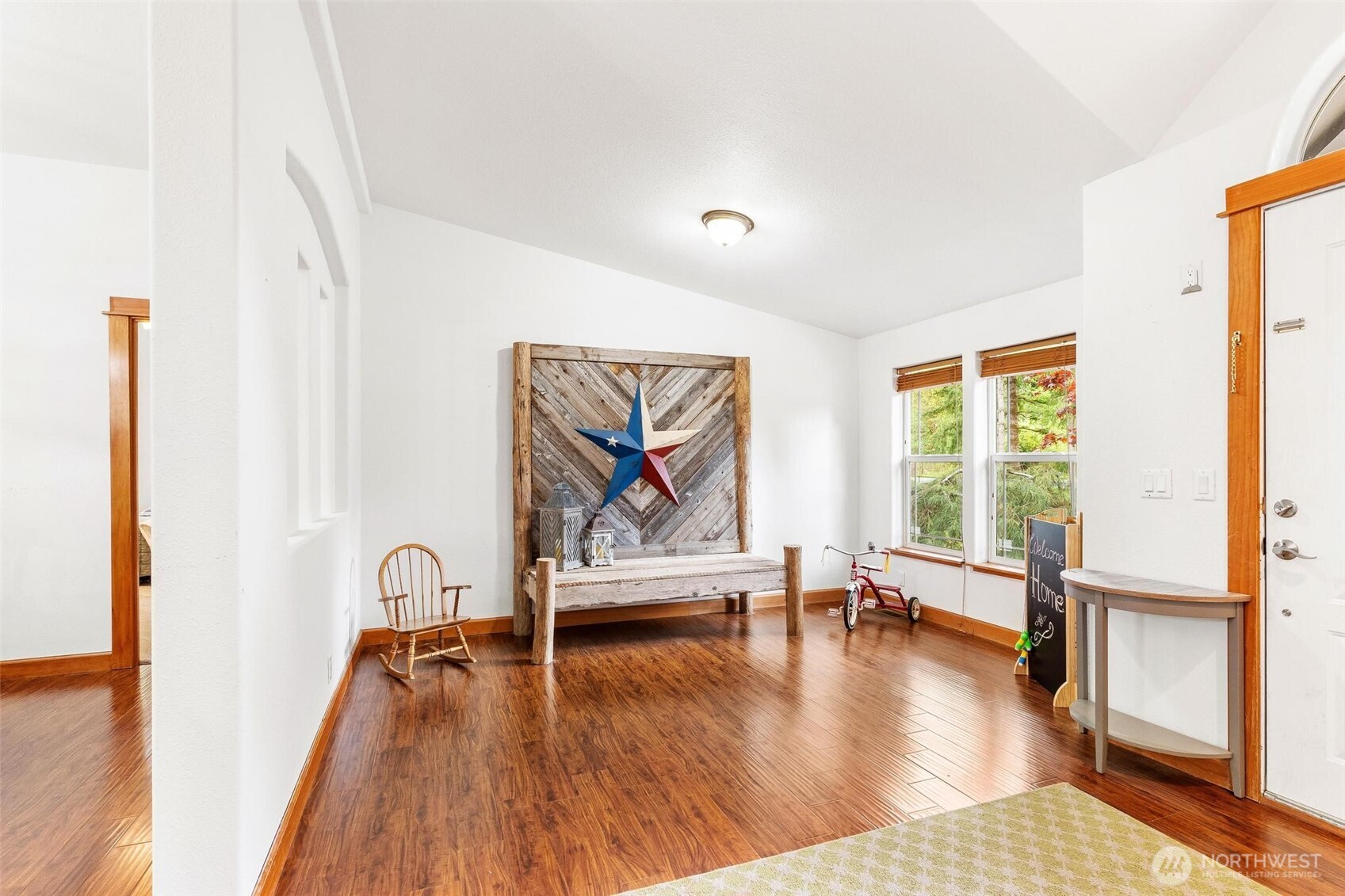 4915 Schwarzmiller Road Lake Stevens, WA 98258 - Photo 6 of 40 a view of a livingroom with furniture wooden floor and window