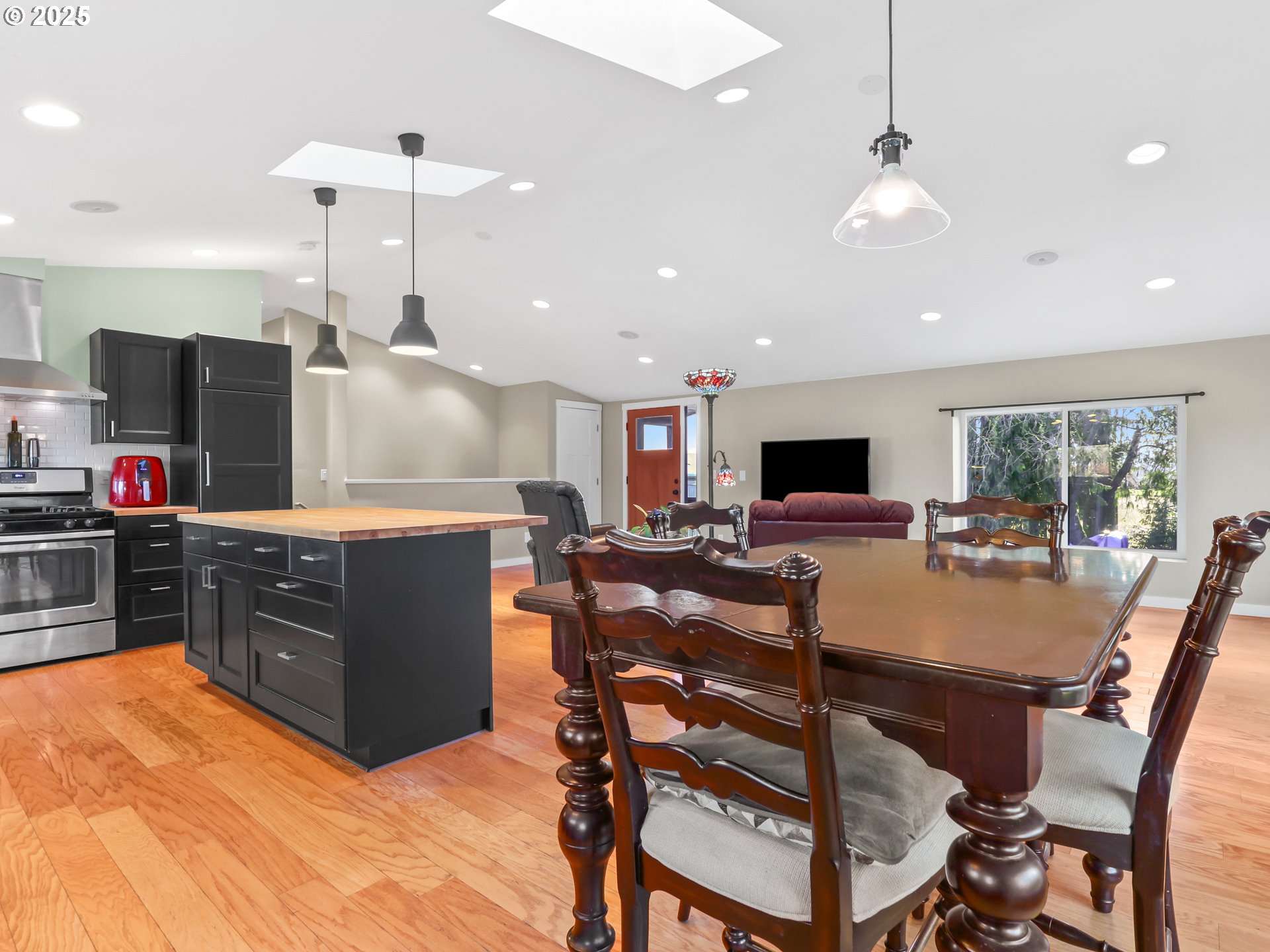 5714 Northwest 169th Street Ridgefield, WA 98642 - Photo 12 of 48 a large kitchen with a table and chairs in it