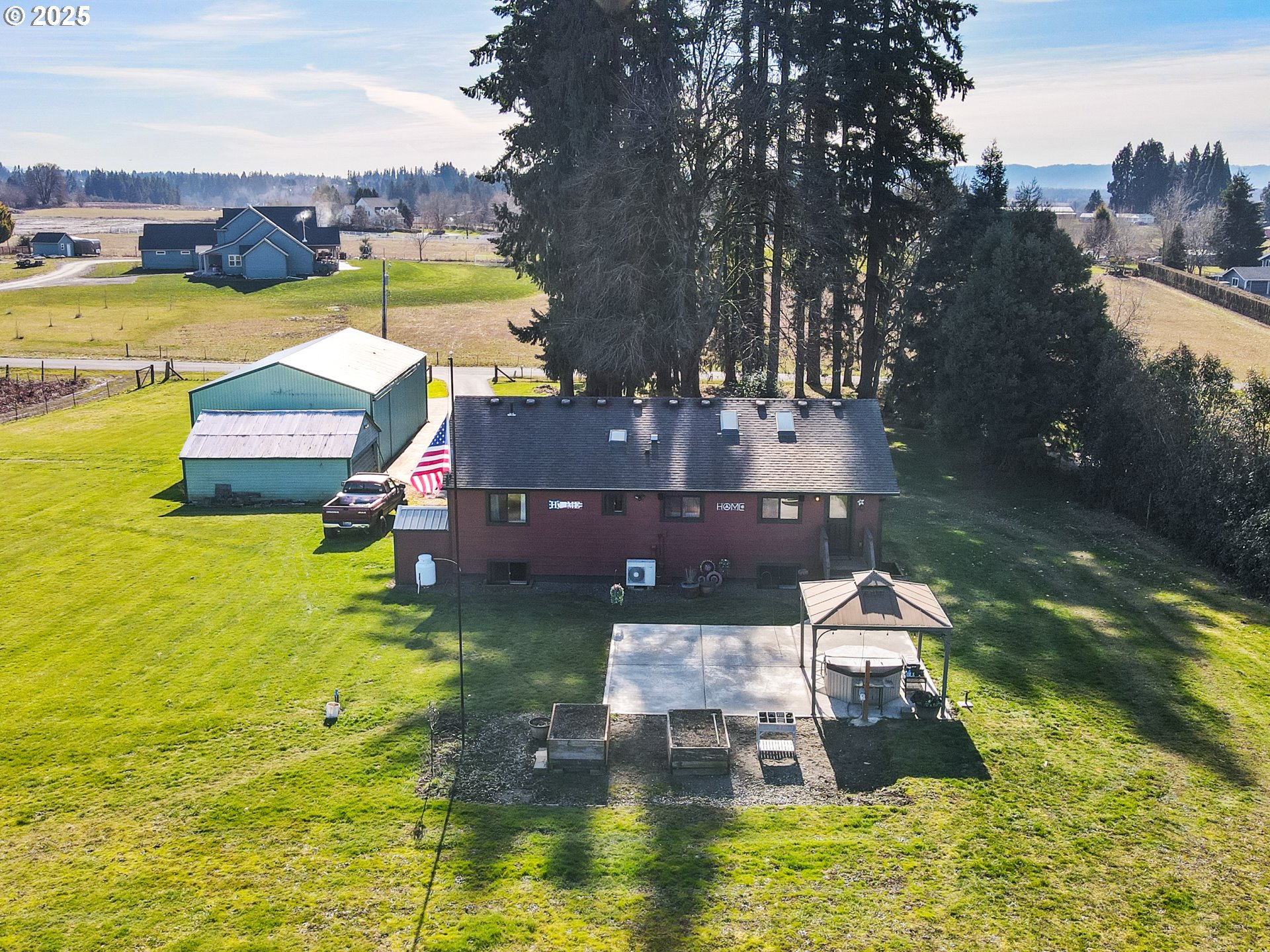 5714 Northwest 169th Street Ridgefield, WA 98642 - Photo 2 of 48 an aerial view of a house with swimming pool