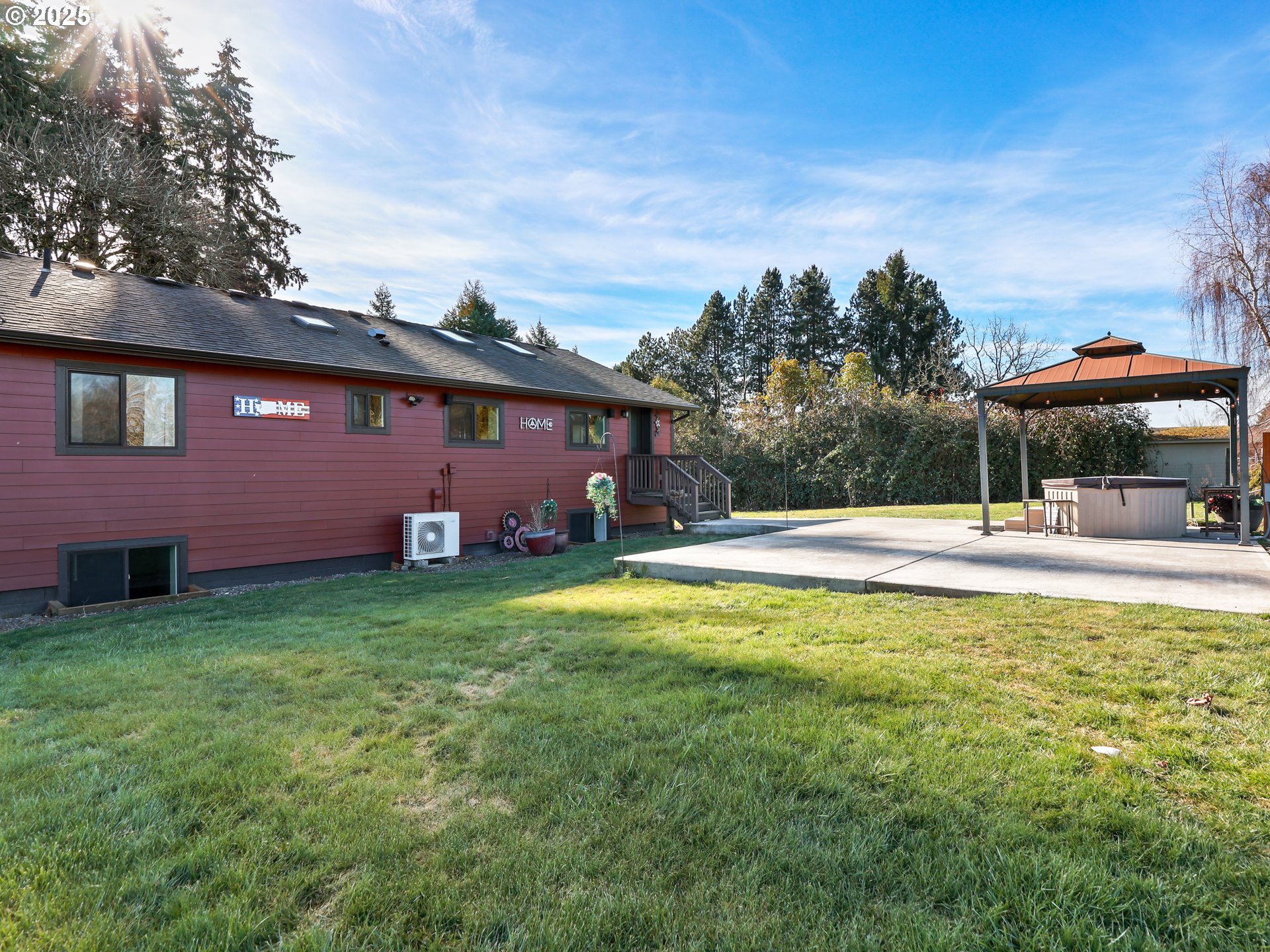 5714 Northwest 169th Street Ridgefield, WA 98642 - Photo 40 of 48 a view of swimming pool with a garden and trees
