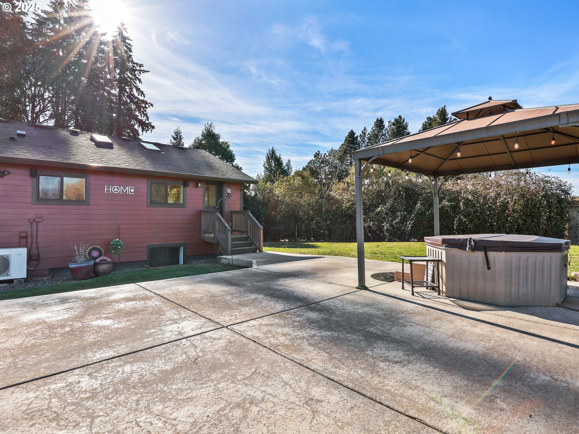 5714 Northwest 169th Street Ridgefield, WA 98642 - Photo 4 of 48 a view of a back yard of the house