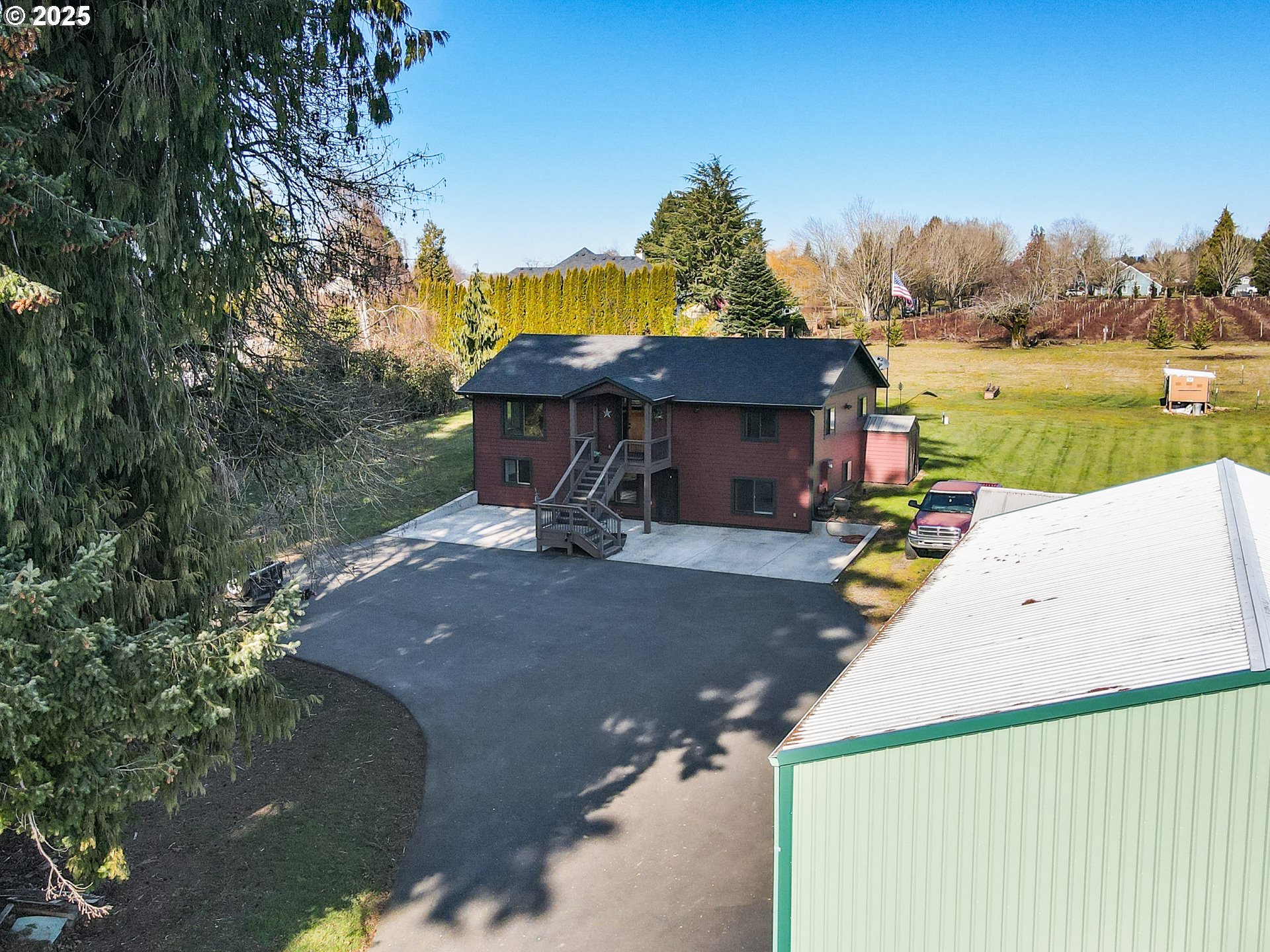 5714 Northwest 169th Street Ridgefield, WA 98642 - Photo 44 of 48 a view of a house with yard and sitting area
