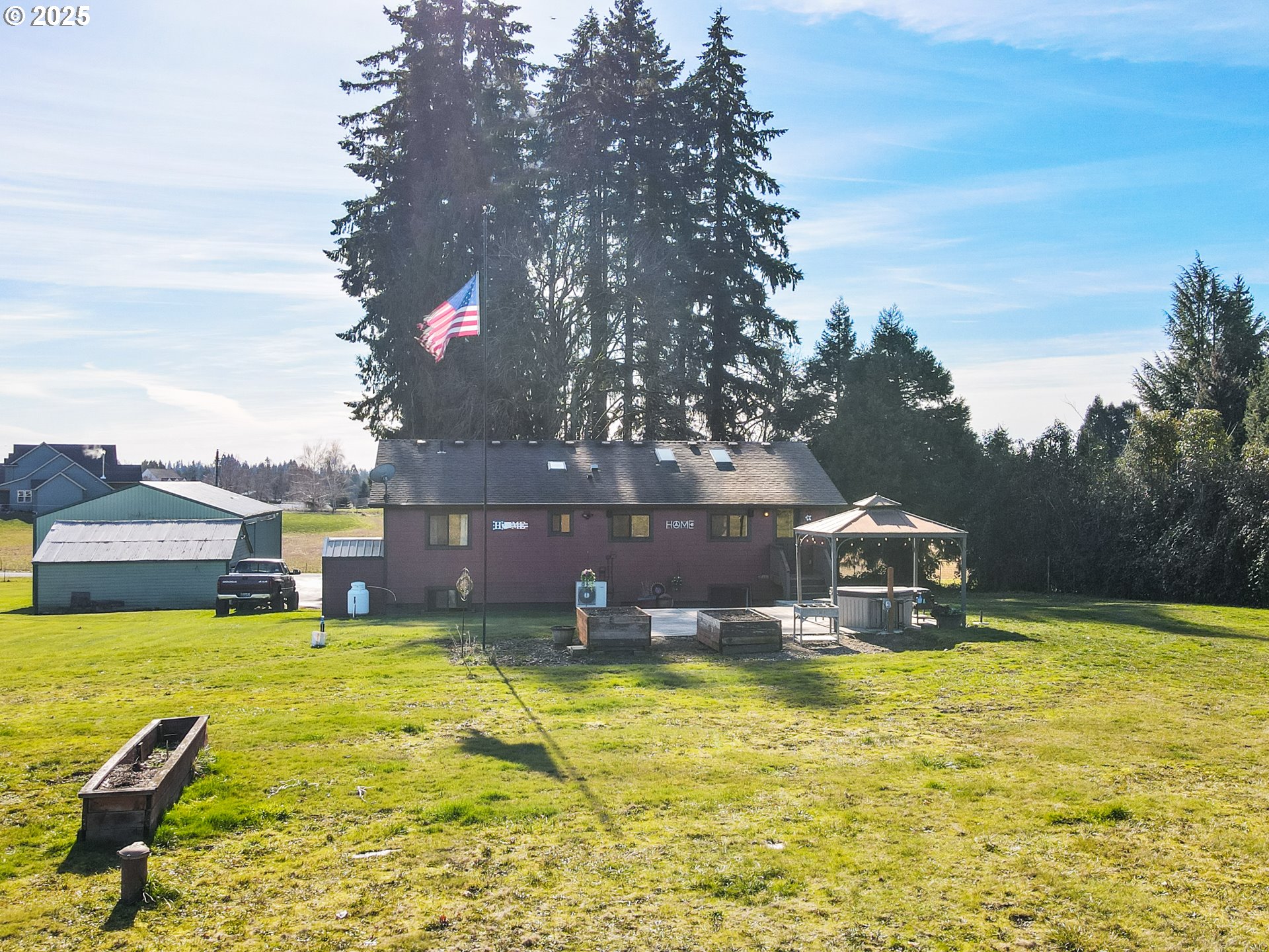 5714 Northwest 169th Street Ridgefield, WA 98642 - Photo 47 of 48 a view of a swimming pool with a garden