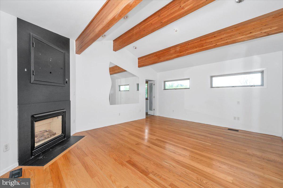 11127 Dublin Road Woodsboro, MD 21798 - Photo 41 of 62 a view of empty room with wooden floor